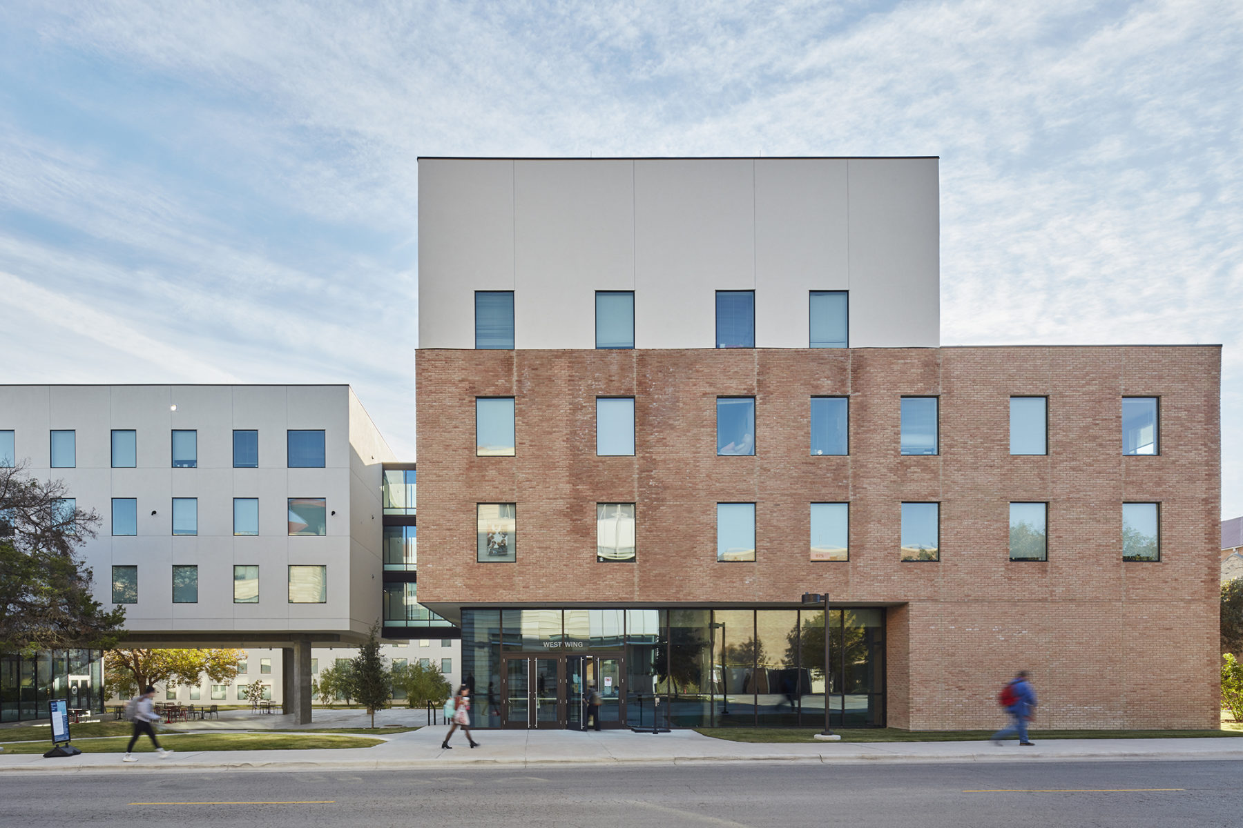 exterior elevational view of building with lobby on ground floor