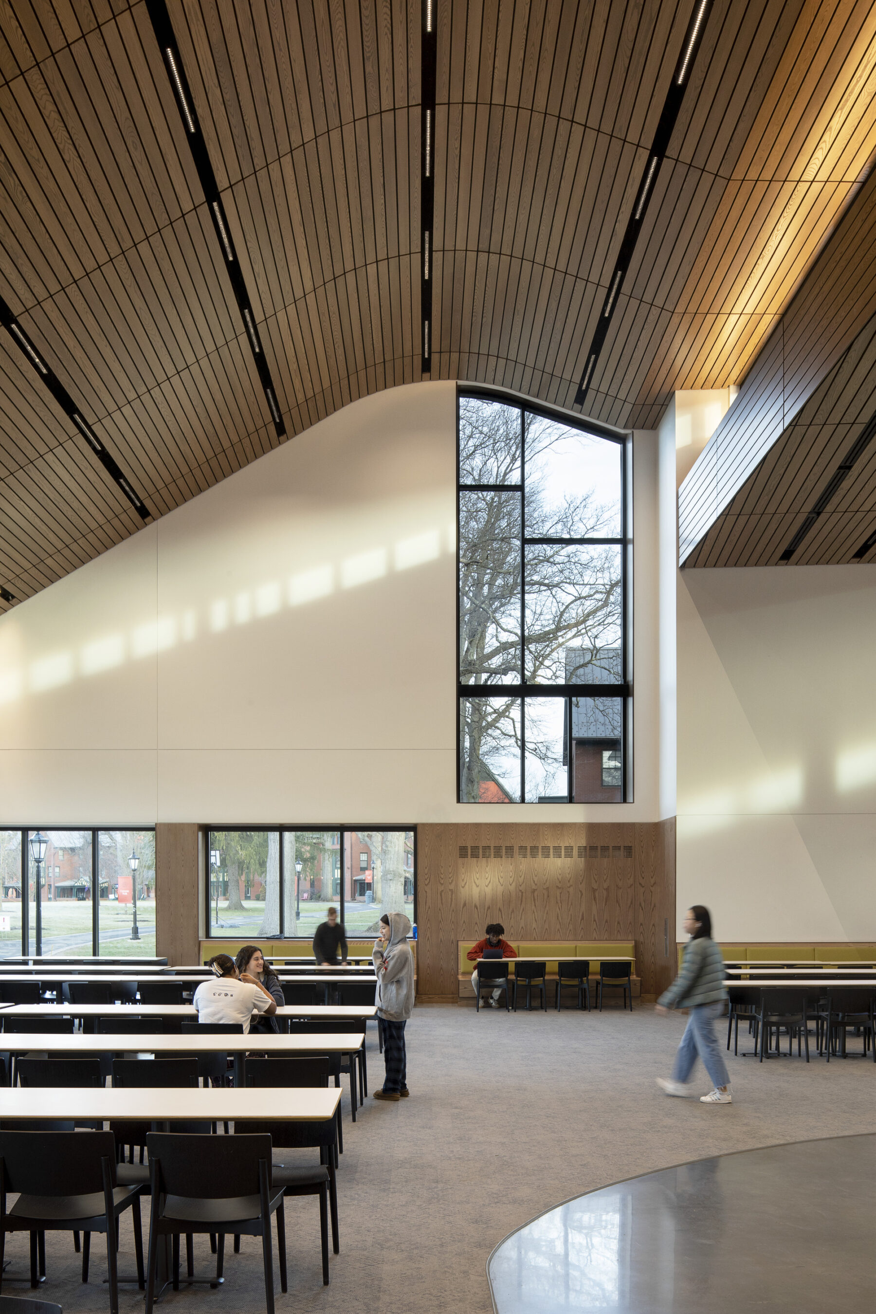 Interior photograph of dining hall corresponding to the model