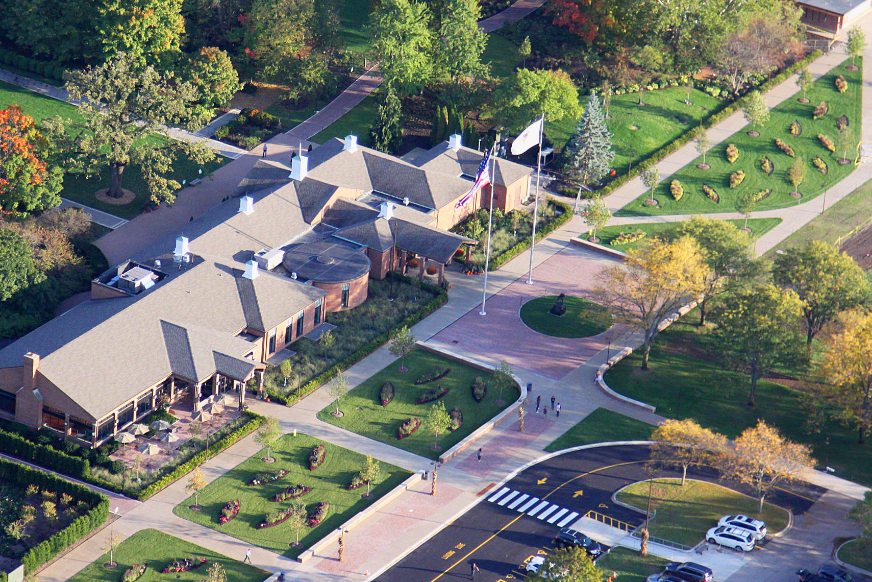 aerial photo of a building with a landscape in front