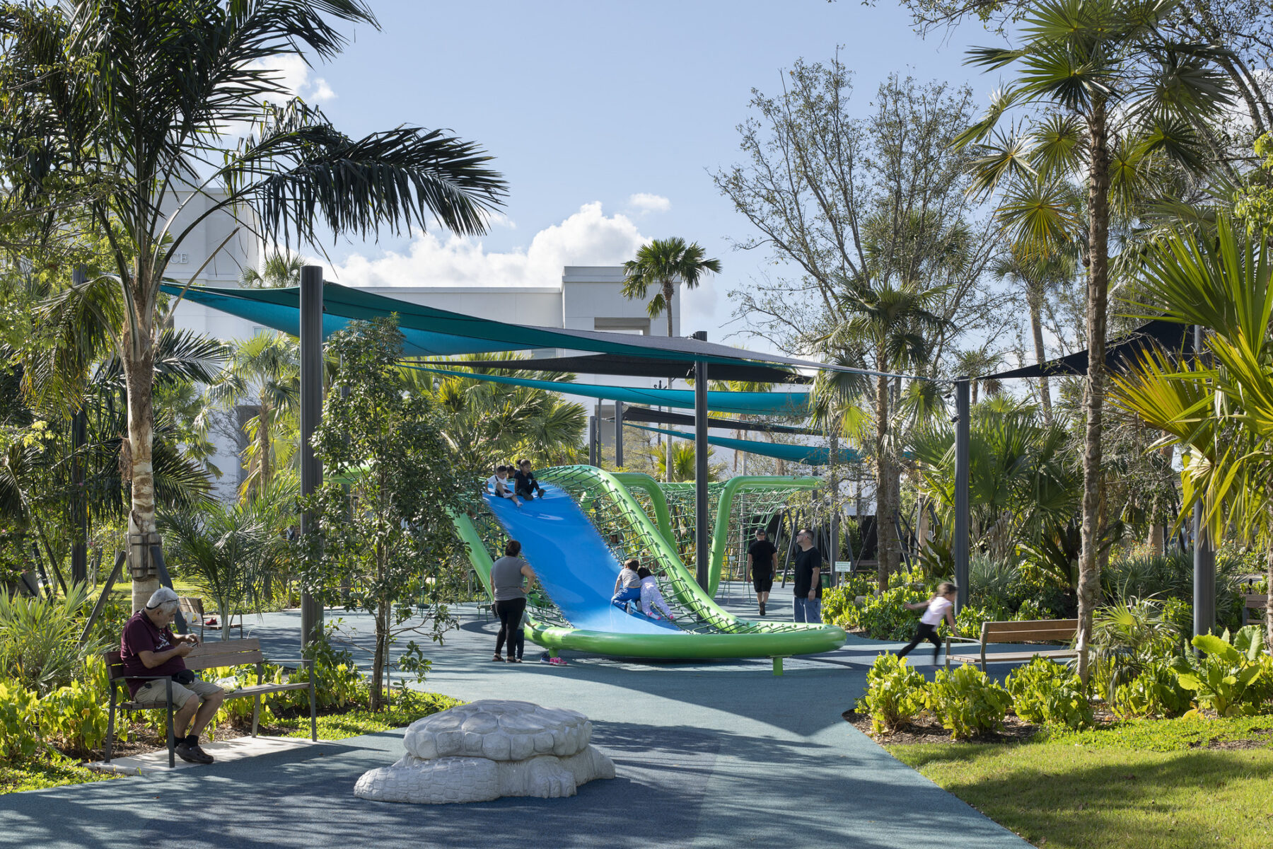 photograph of losner park playground with large slide in background