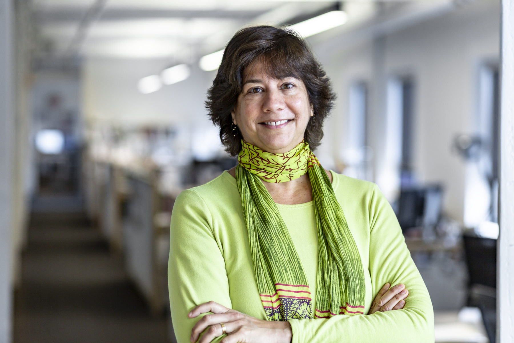 tamar warburg smiling wearing green