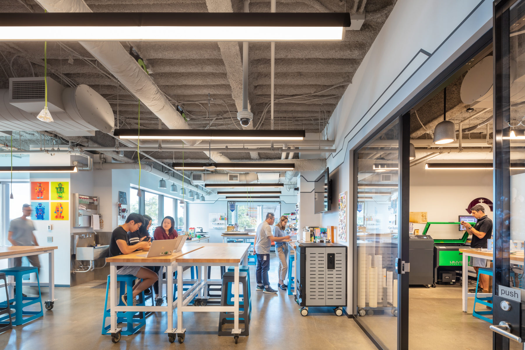 people working together in a maker space