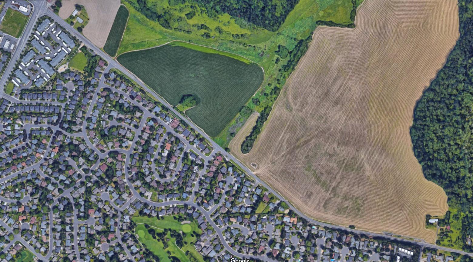 an aerial view of a suburban development