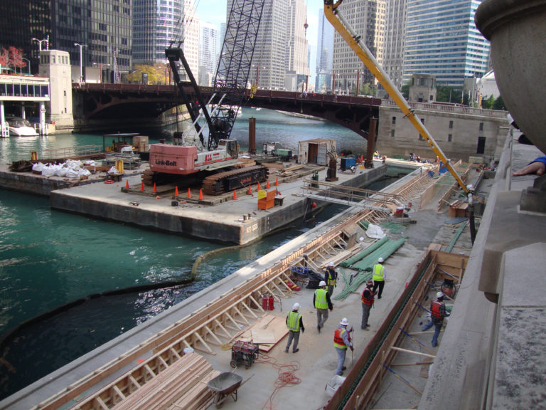 a photo of a construction site on a river