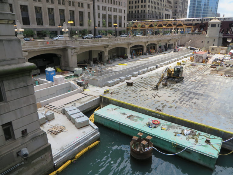 a photo of a construction site on a river