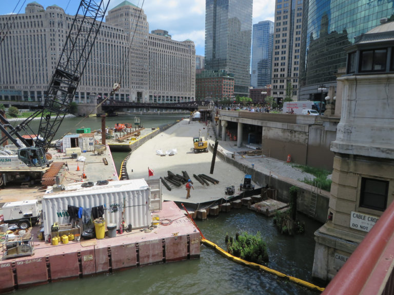 a photo of a construction site on a river