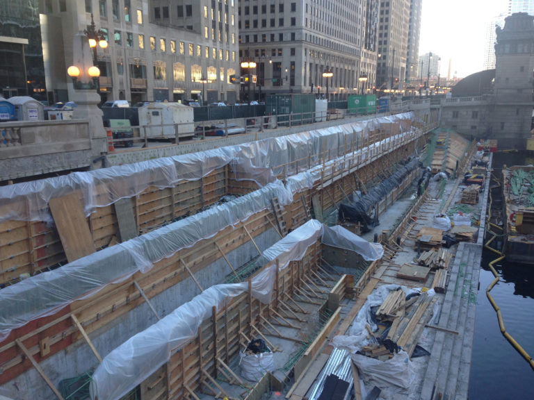 a photo of a construction site on a river