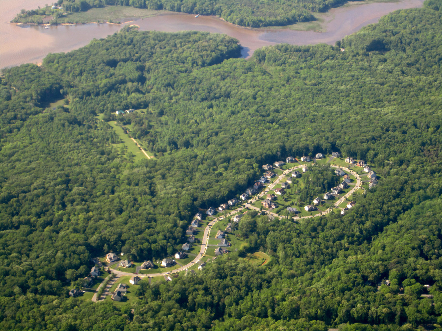 an aerial view of a suburban development