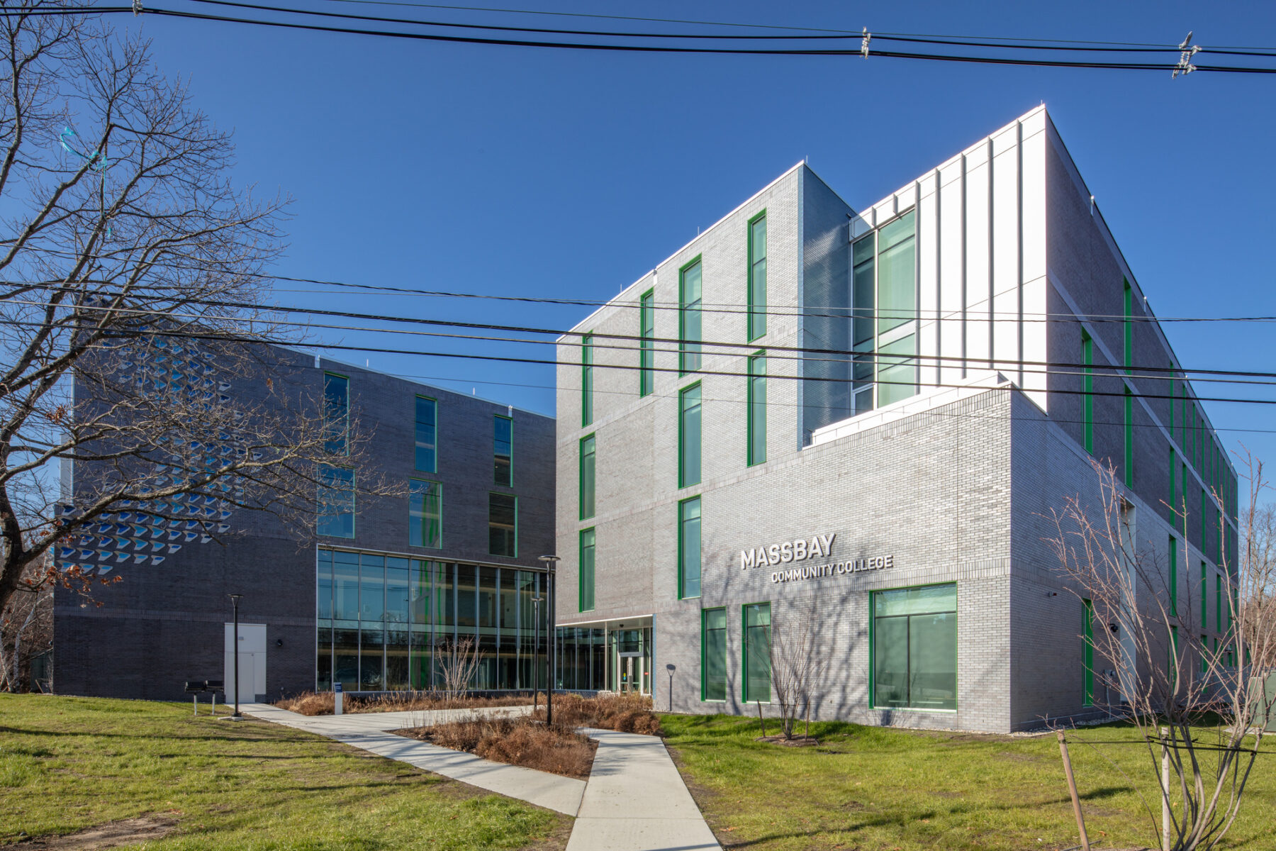 perspective photograph of entrance to MassBay Community College Center for Health Sciences, Early Childhood, and Human Services