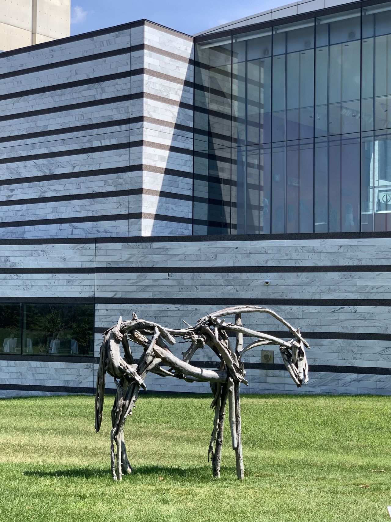 Sculpture of a horse made out of sticks