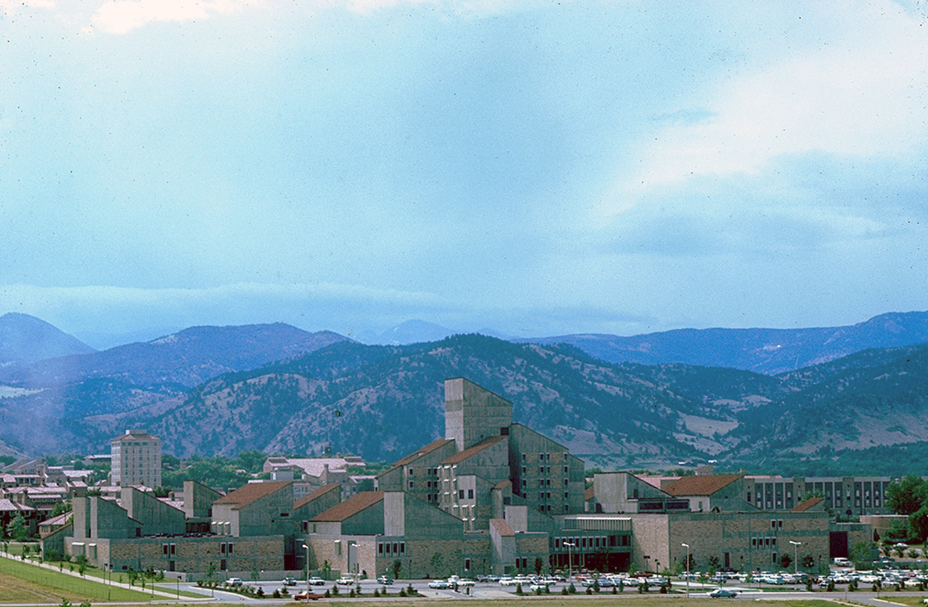 Angular building set in front of mountains