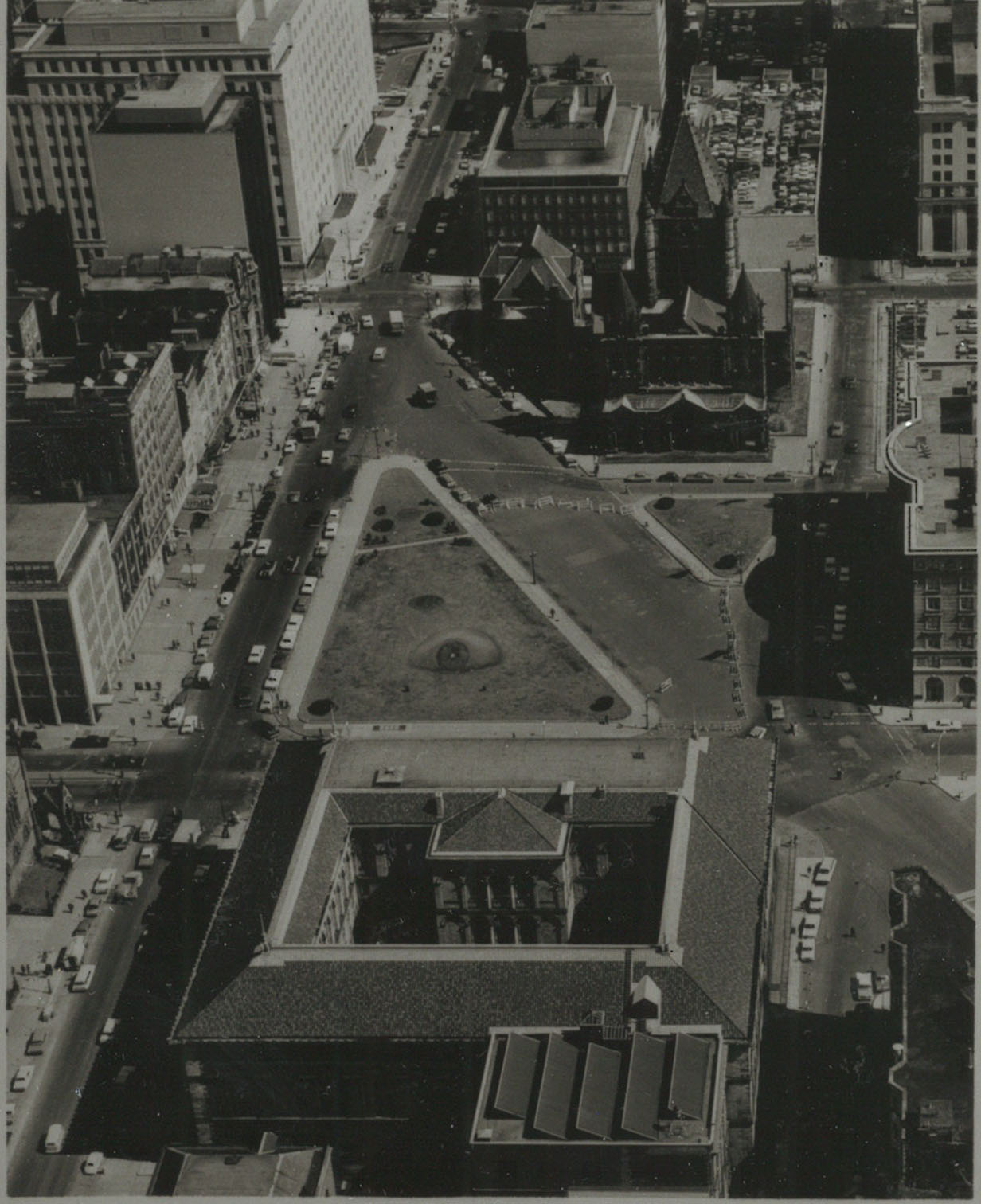 Black and white historical aerial photo of Copley Plaza when it was a triangular shape