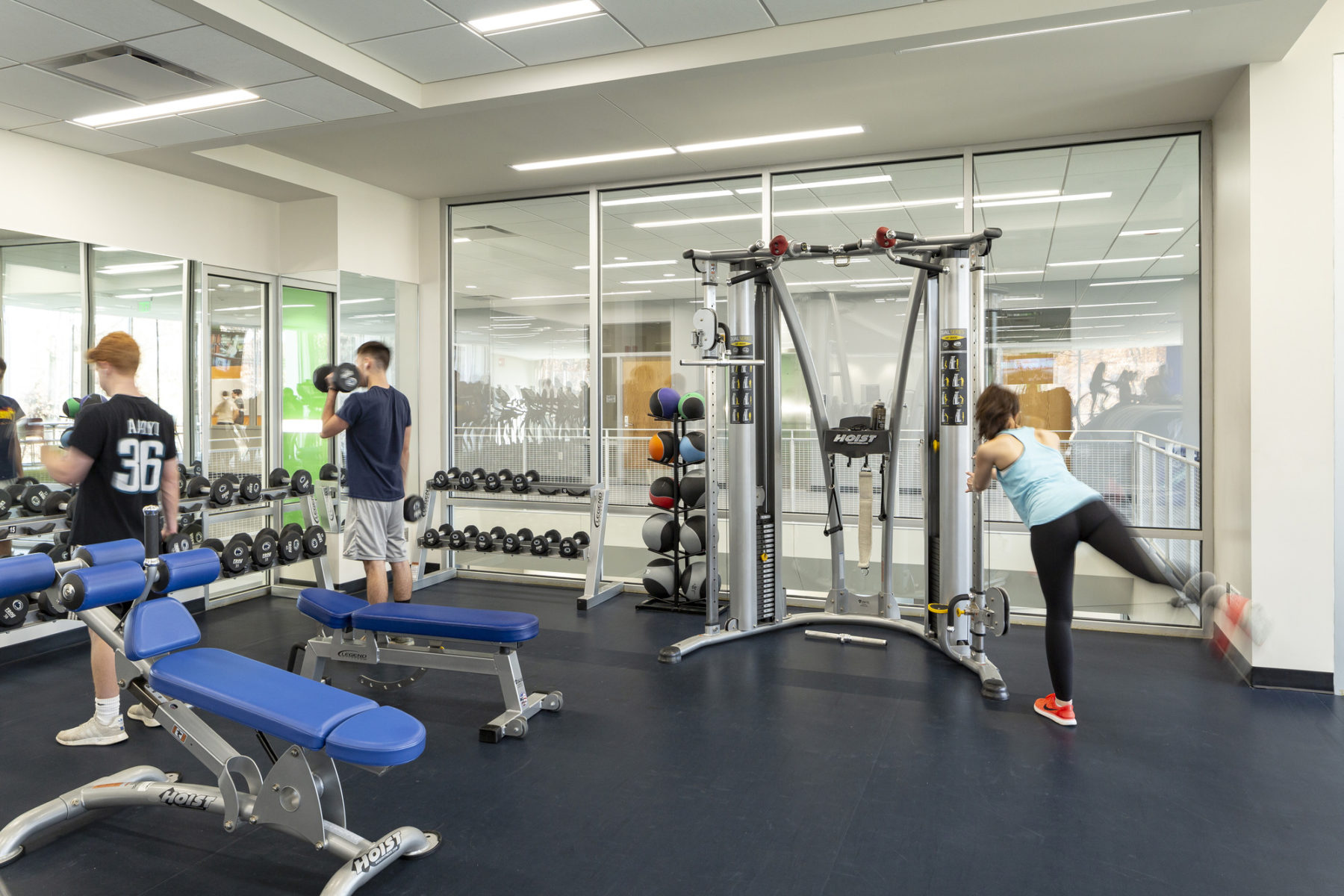 interior weight room photo of people working out