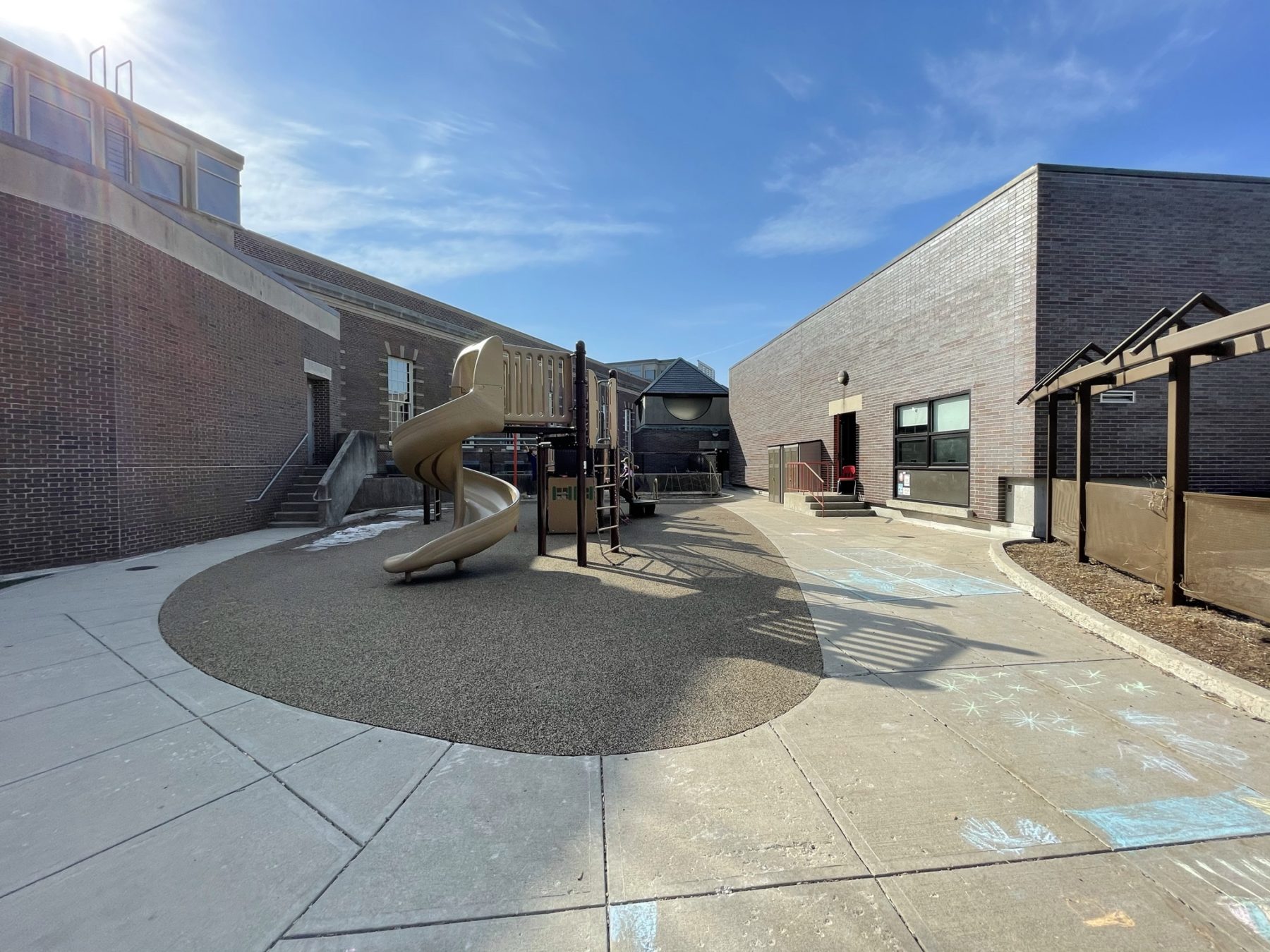 Exterior picture of courtyard in John Pierce School