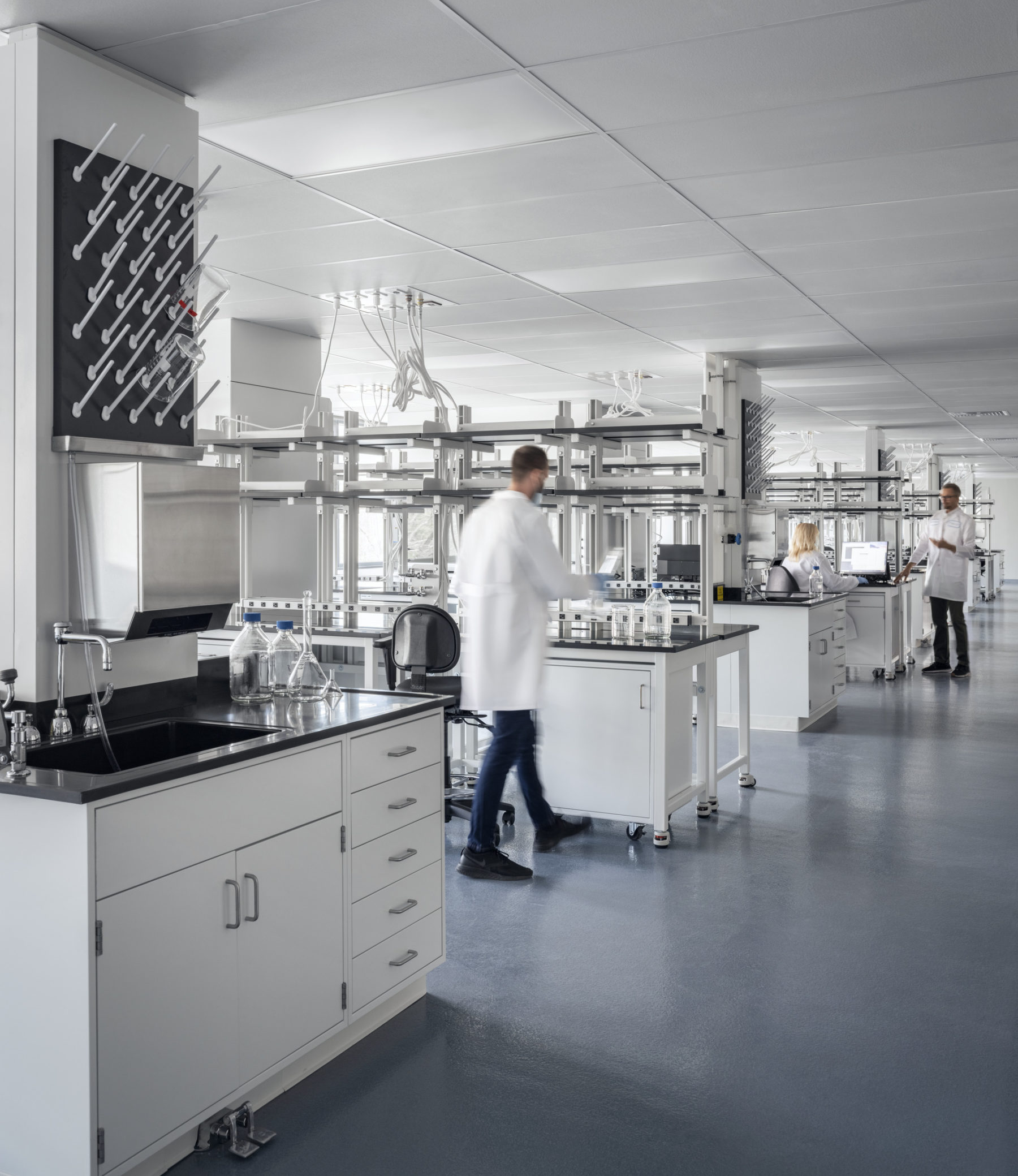 photo of man standing at lab bench