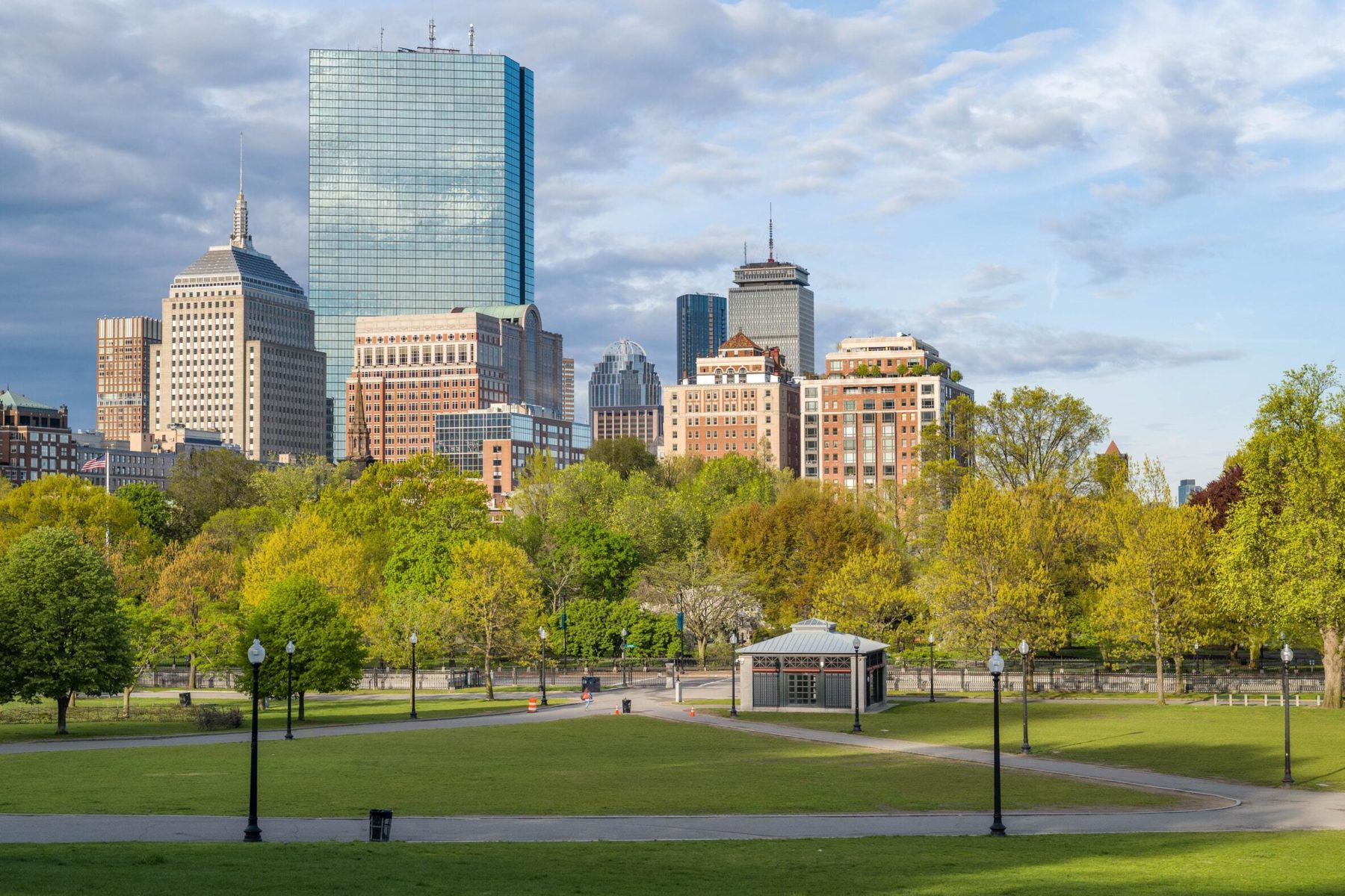 photo of the Boston Common with the city skyline in the background