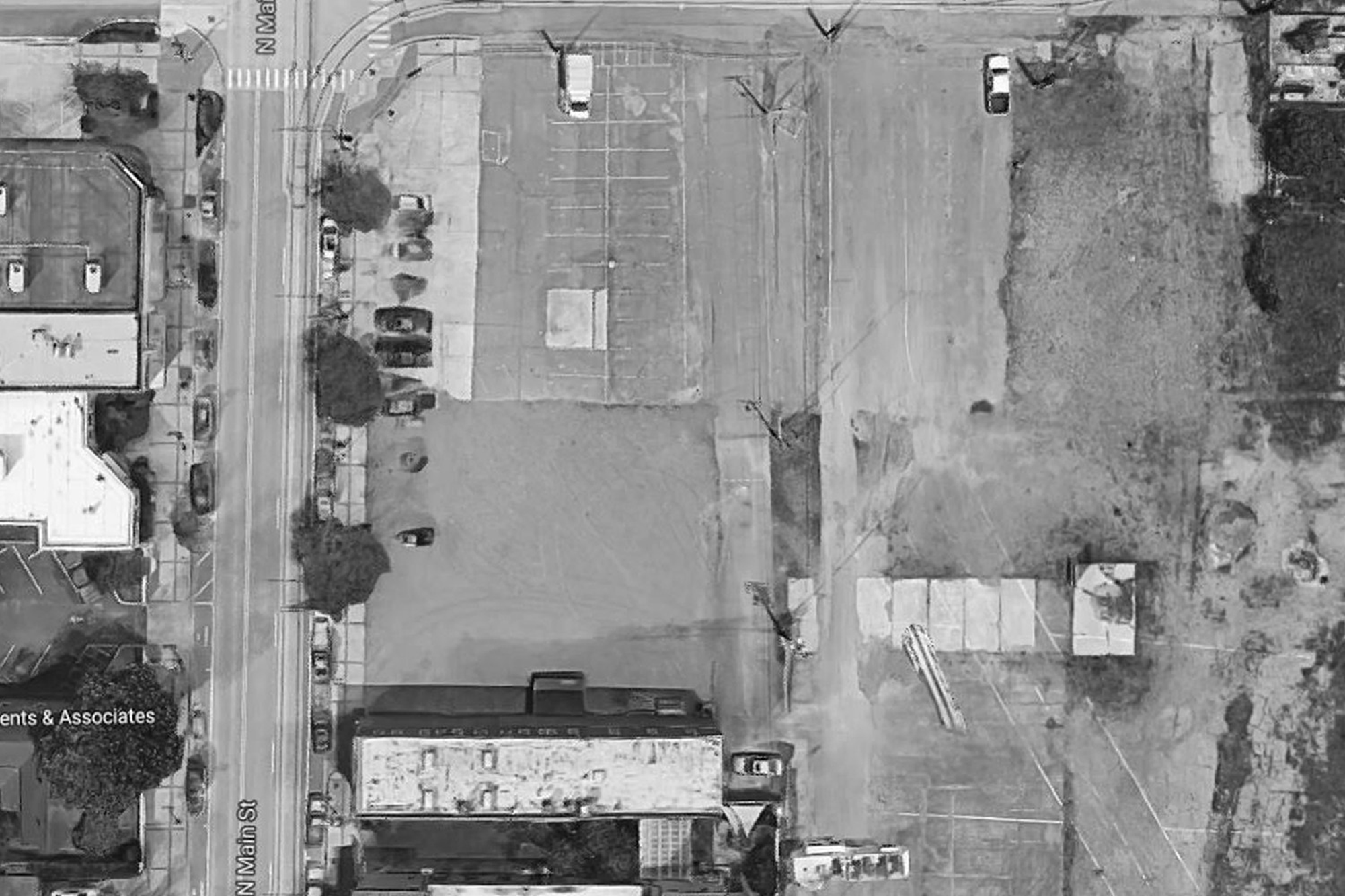 gif of site existing conditions switching between an aerial view and an on-the-ground photo