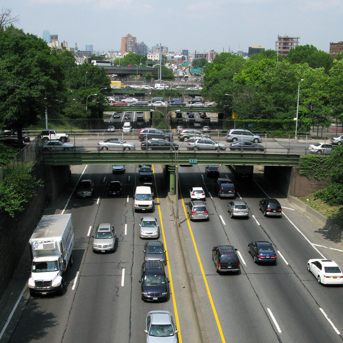 before photo of site showing multilane highway with bridges passing over