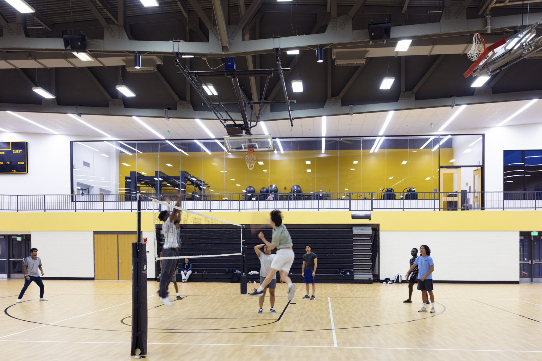 photo of students playing vollyball on renovated gym