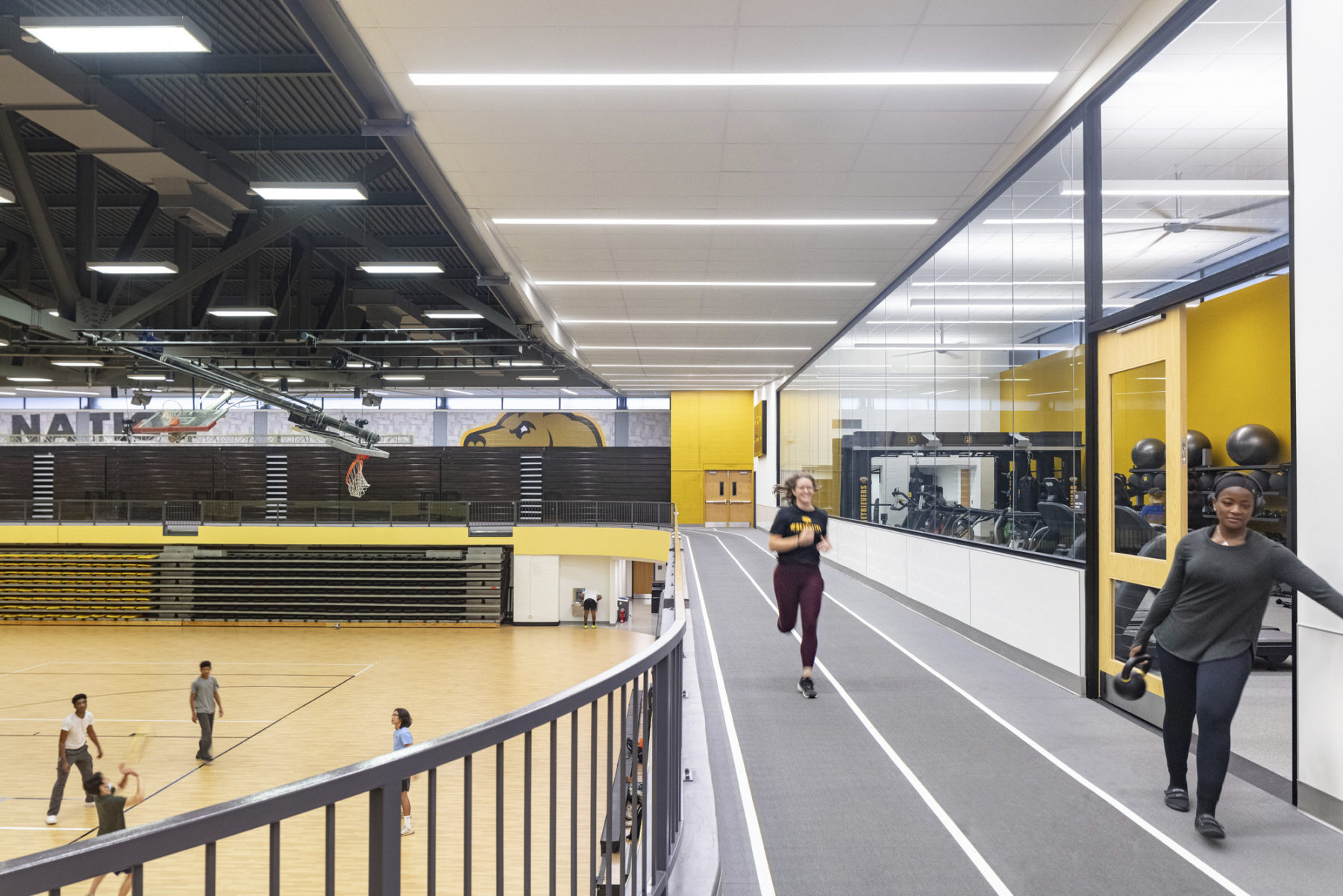 photo of running track above renovated gymnasium