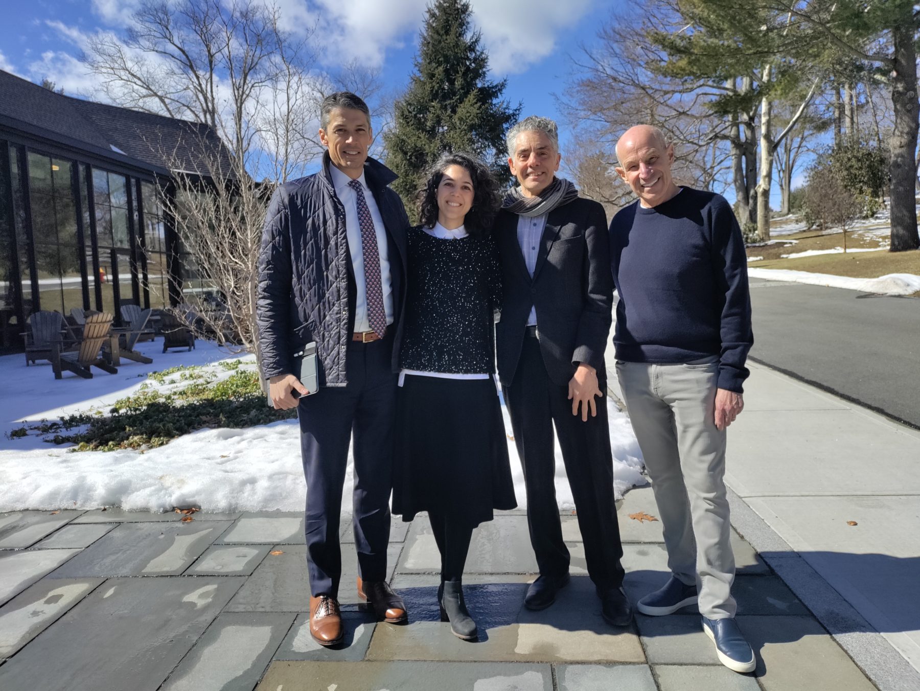 Sasaki designers Marta Guerra Pastrian and Vinicius Gorgati standing with Frederick Gunn head of school and project donor