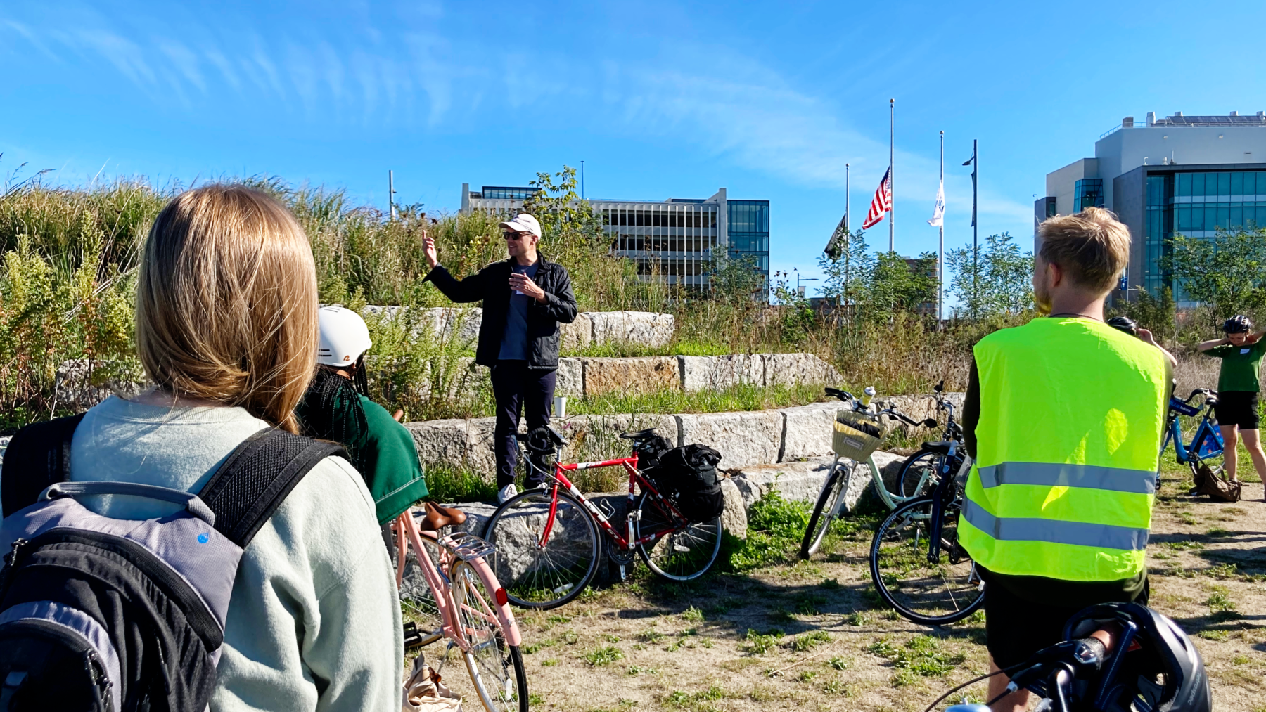 Person speaking to group outside