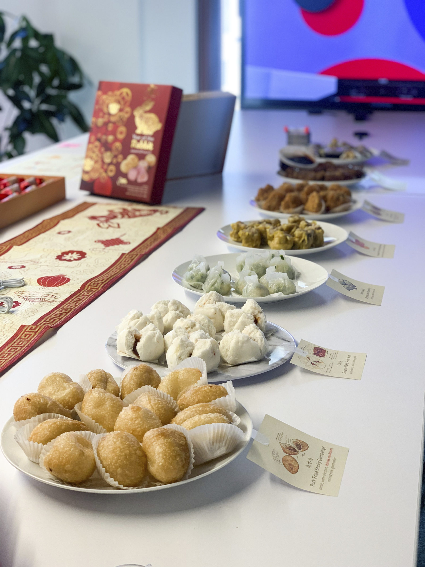 plates of food lined up on a table