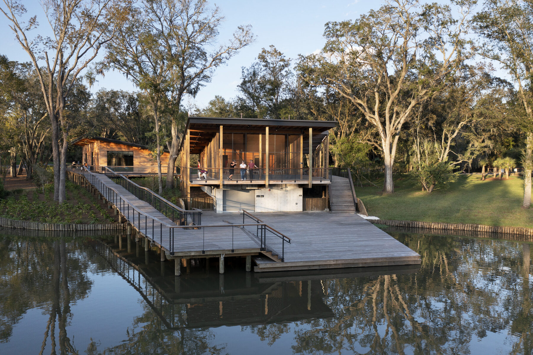 photograph of boathouse from across lagoon