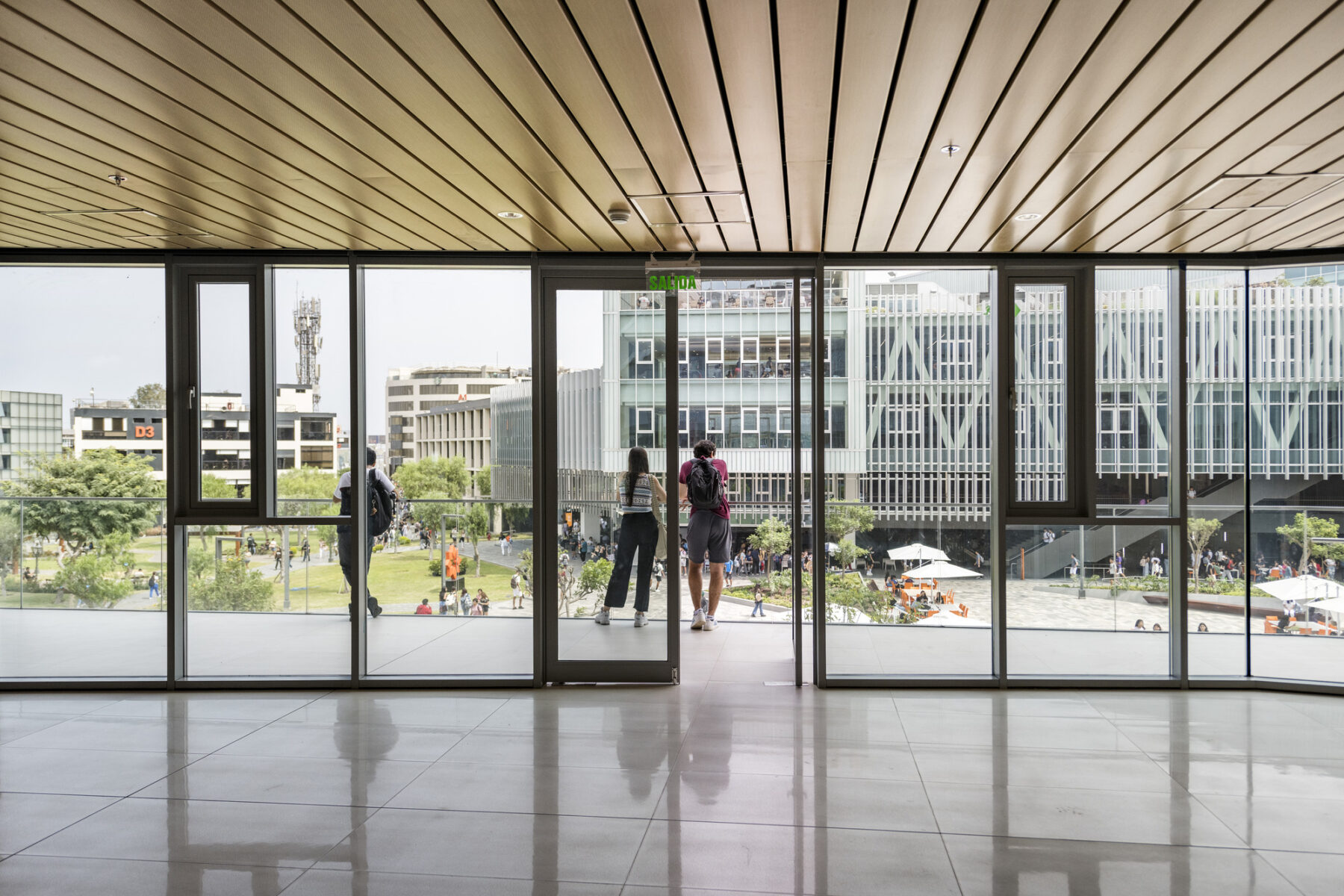 photograph from inside innovation center featuring large glass doors with access to terrace