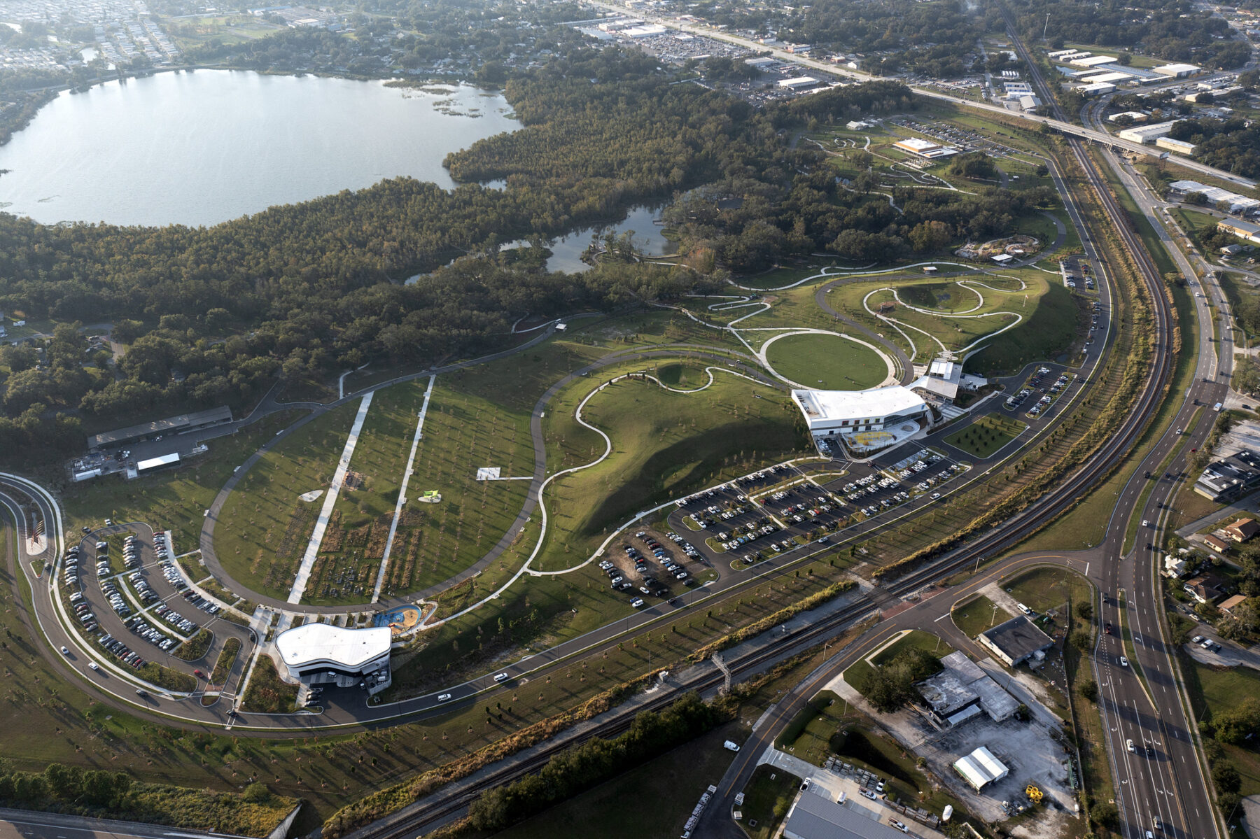 aerial photograph of welcome center shown in relation to main park circulator and nearby florida childrens museum