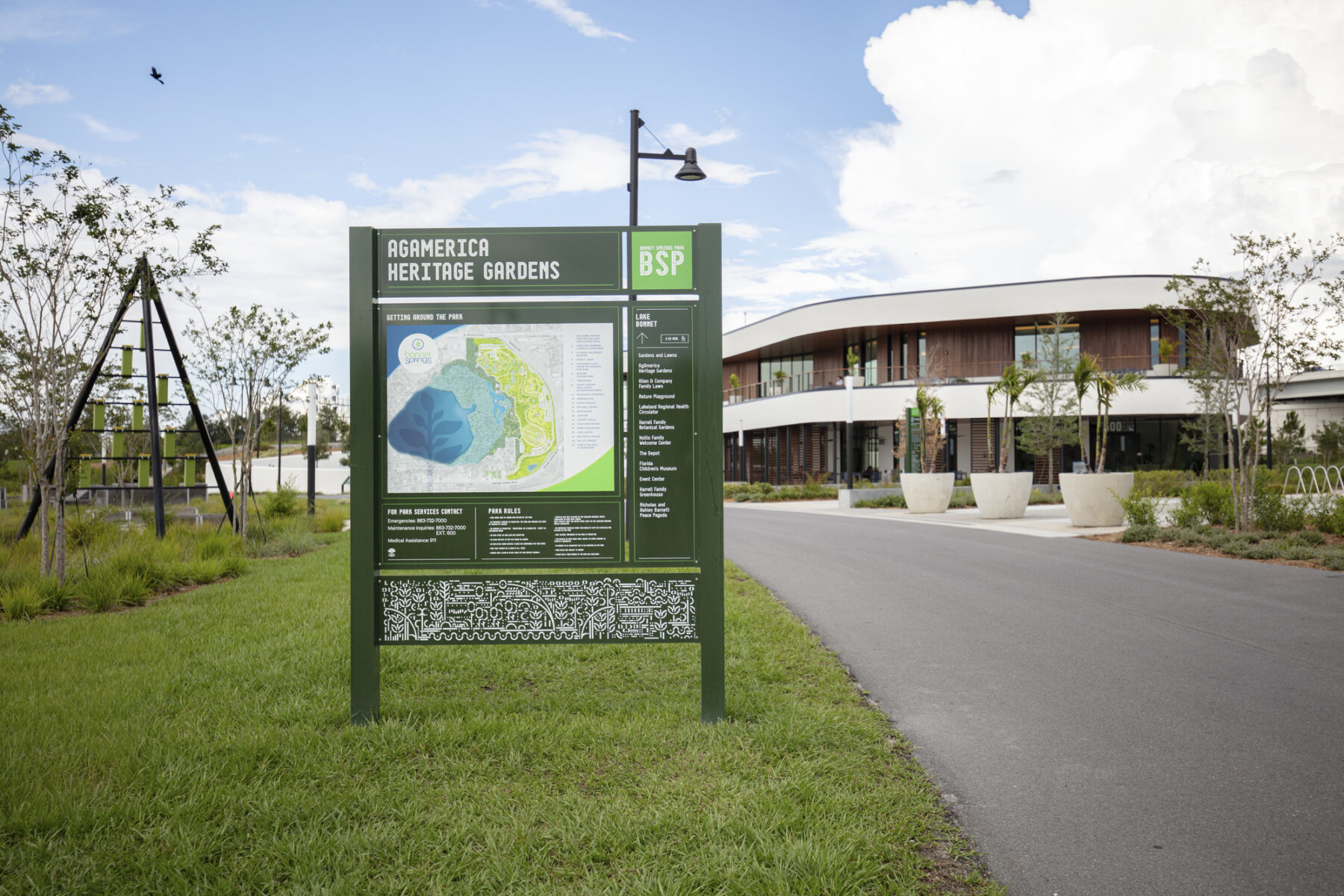 photograph of signage at the entrance to bonnet springs park featuring an illustrative map and graphic design done by Sasaki