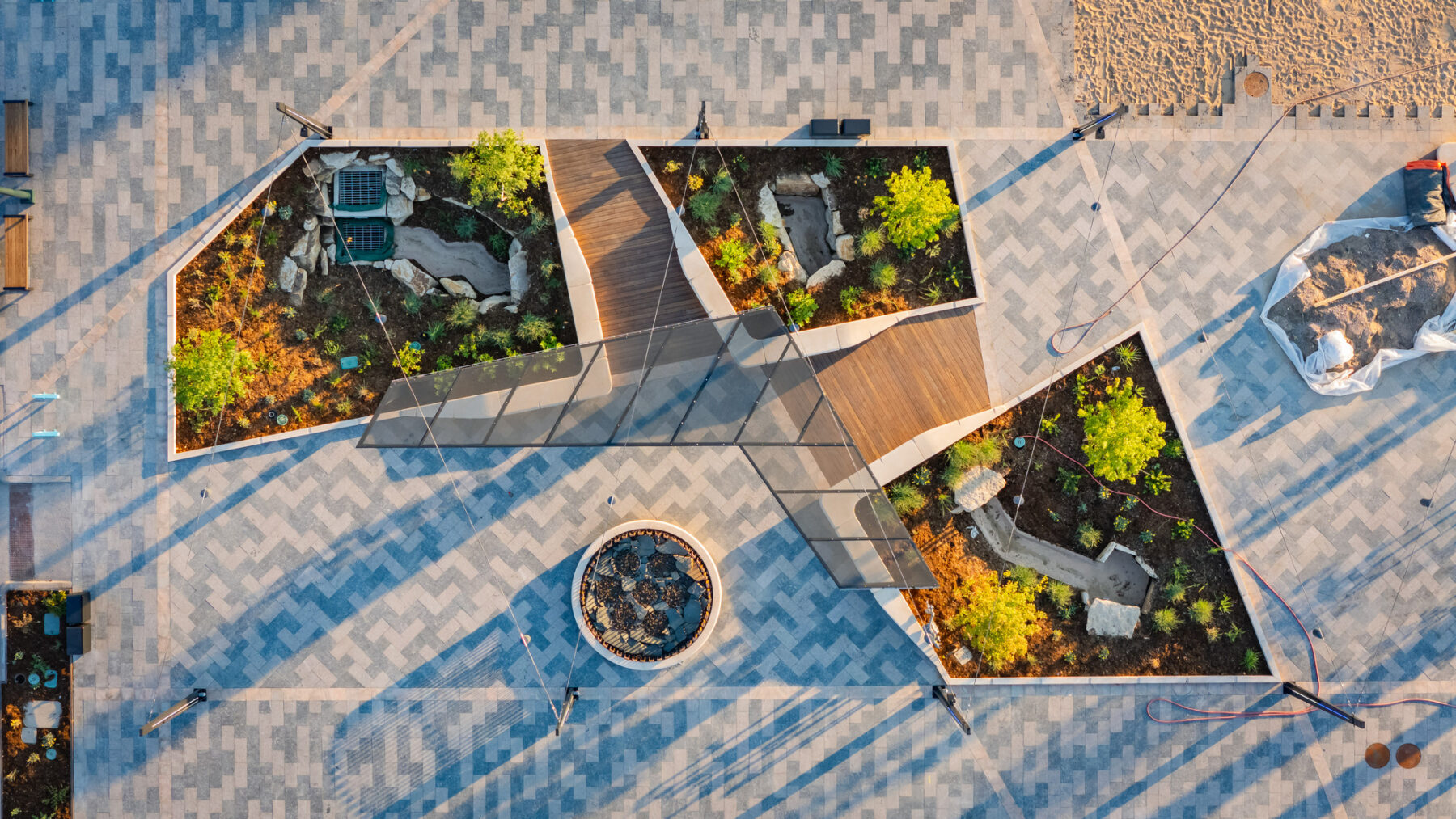 Aerial photo with a top down view of plantings and fire pit