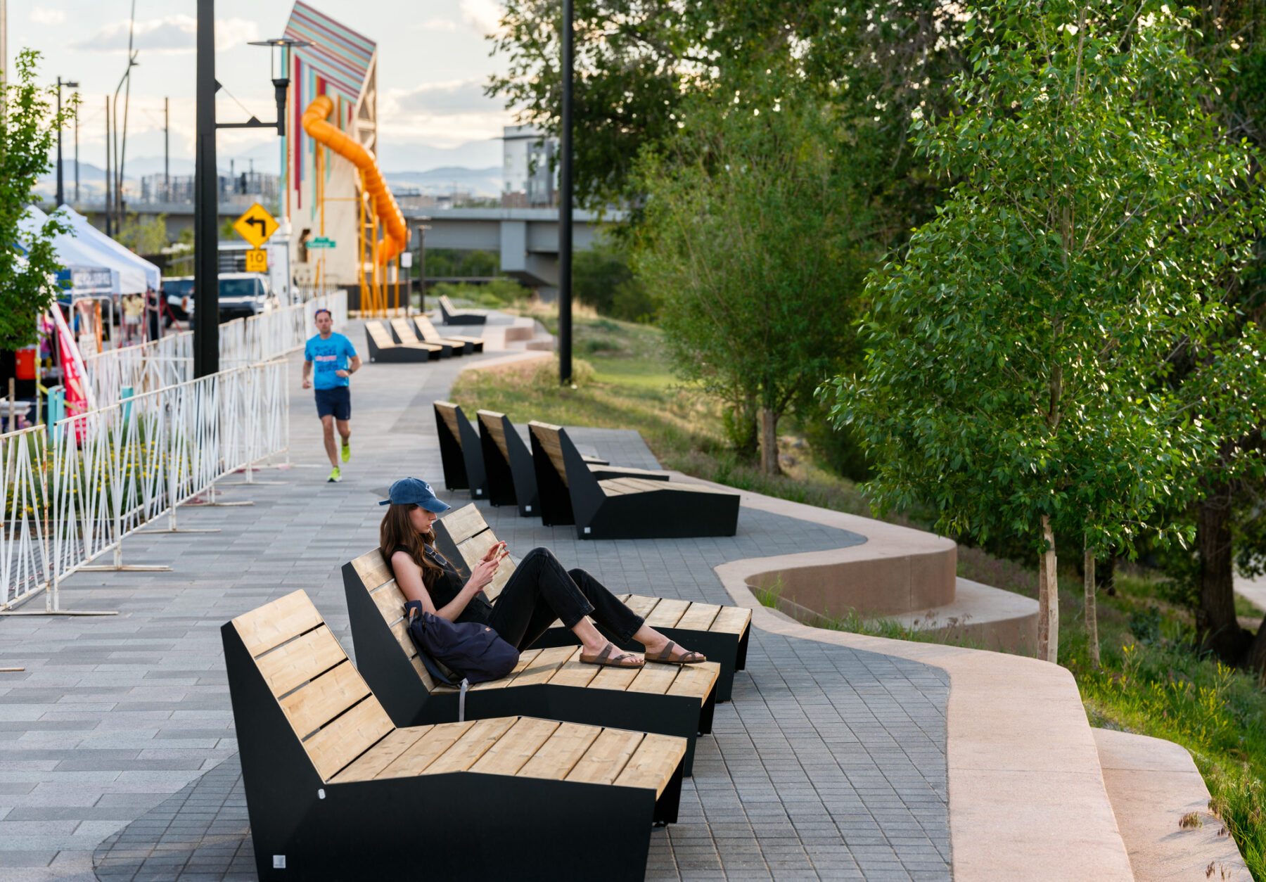 View of person enjoying ergonomic outdoor seating
