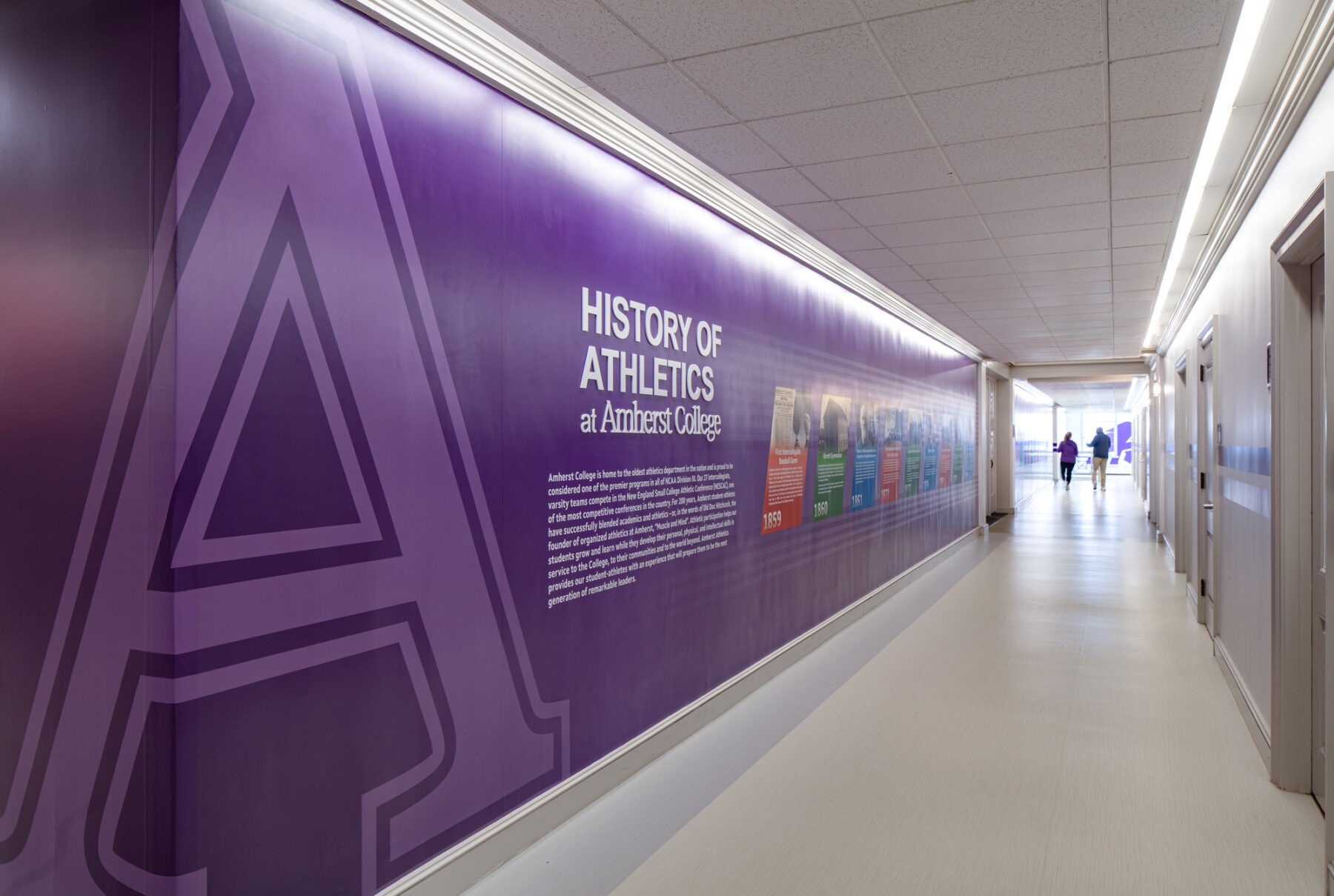 photograph of timeline graphics detailing the history of Amherst College Alumni Gymnasium