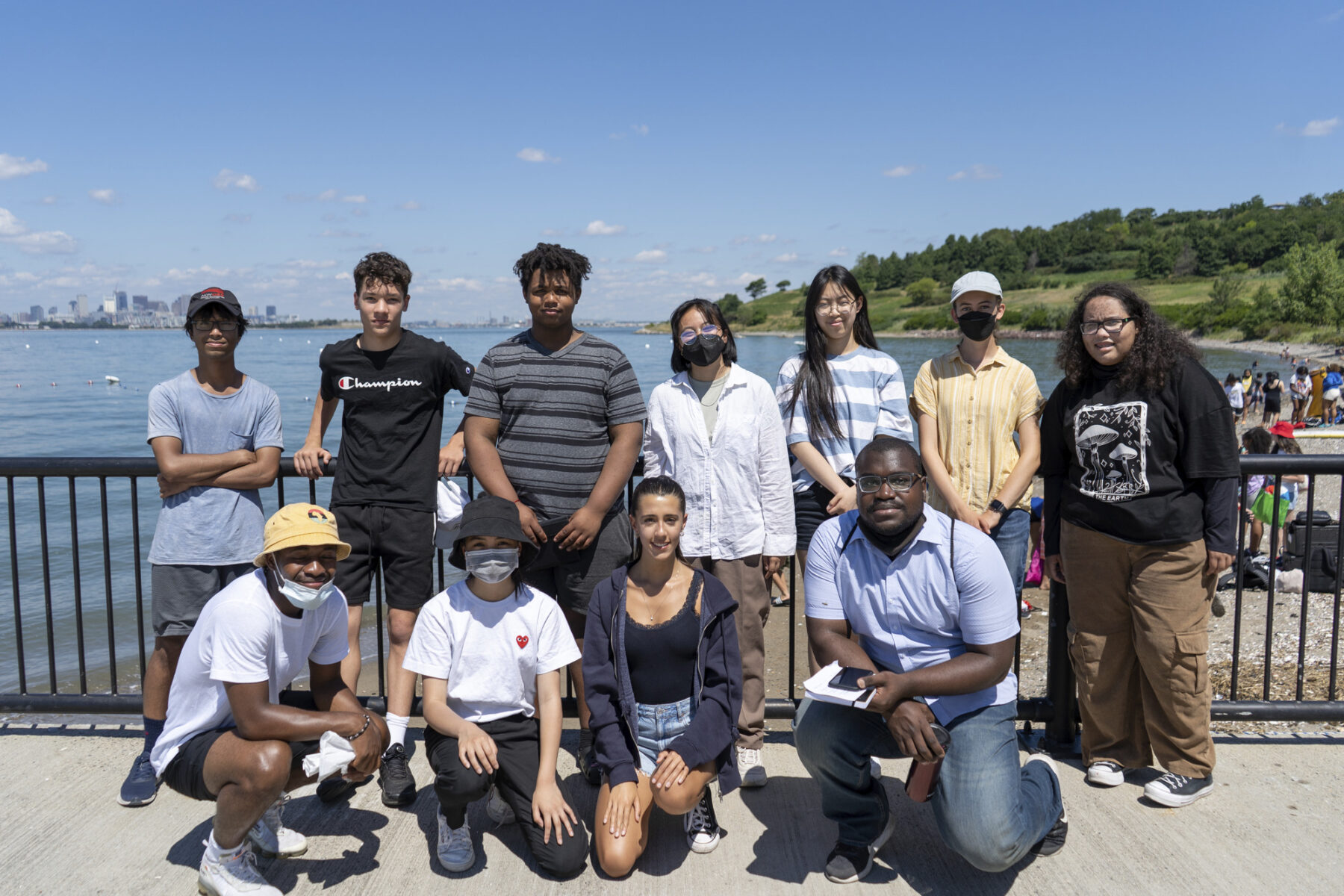 Group photo of high school students at a waterfront