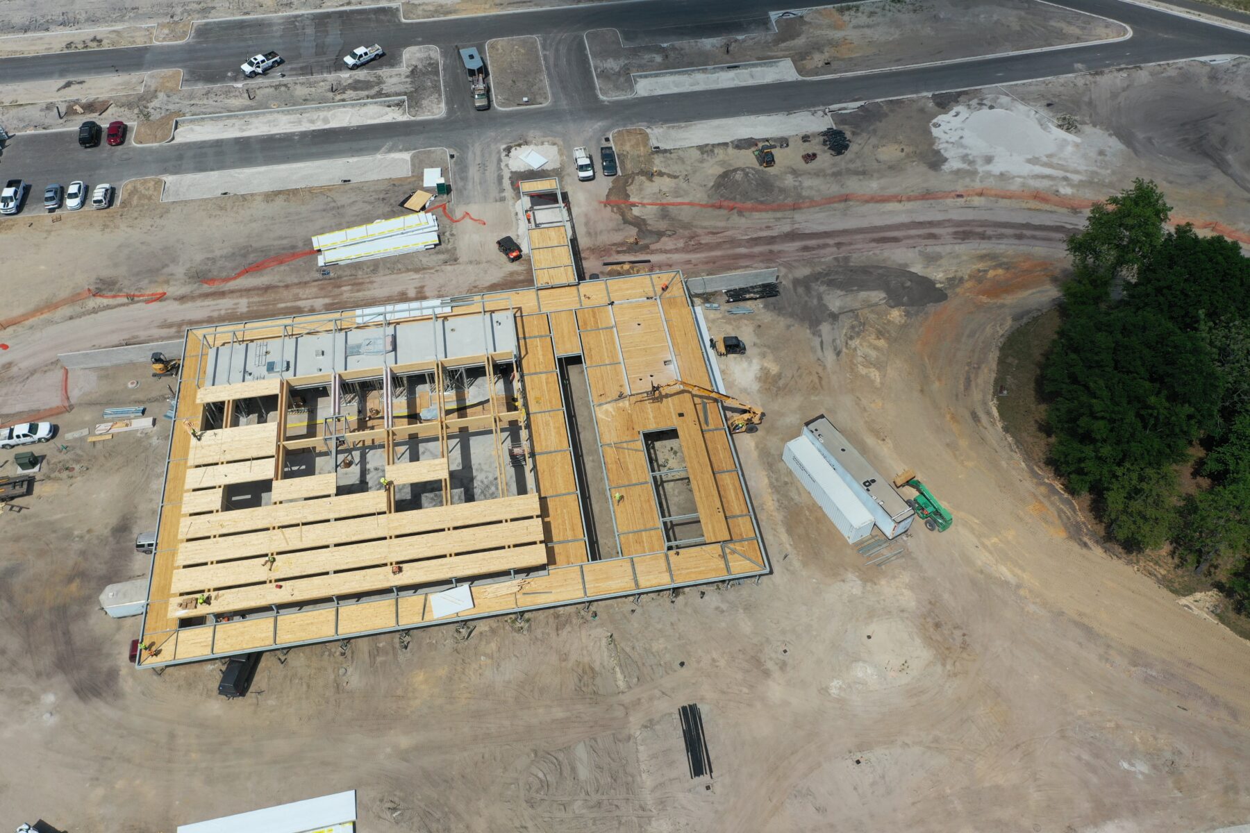 Aerial shot of CLT panel installation over the ballroom’s glulam spans during construction of the Bonnet Springs Park Event Center