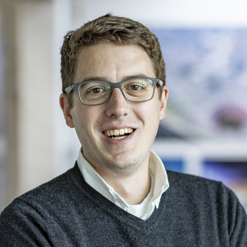 photo portrait of middle aged white man w glasses