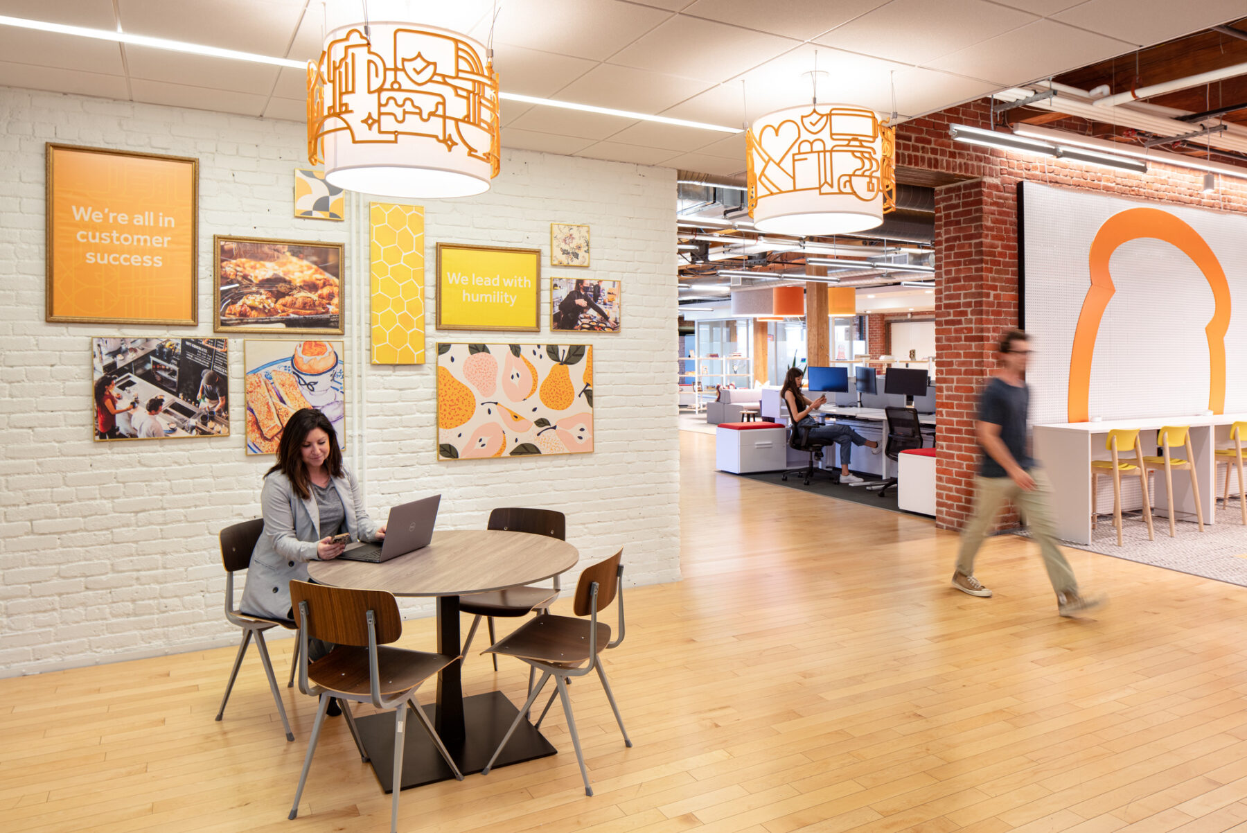 photograph of flexible work sapce featuring fixtures and furniture recycled form their previous office space