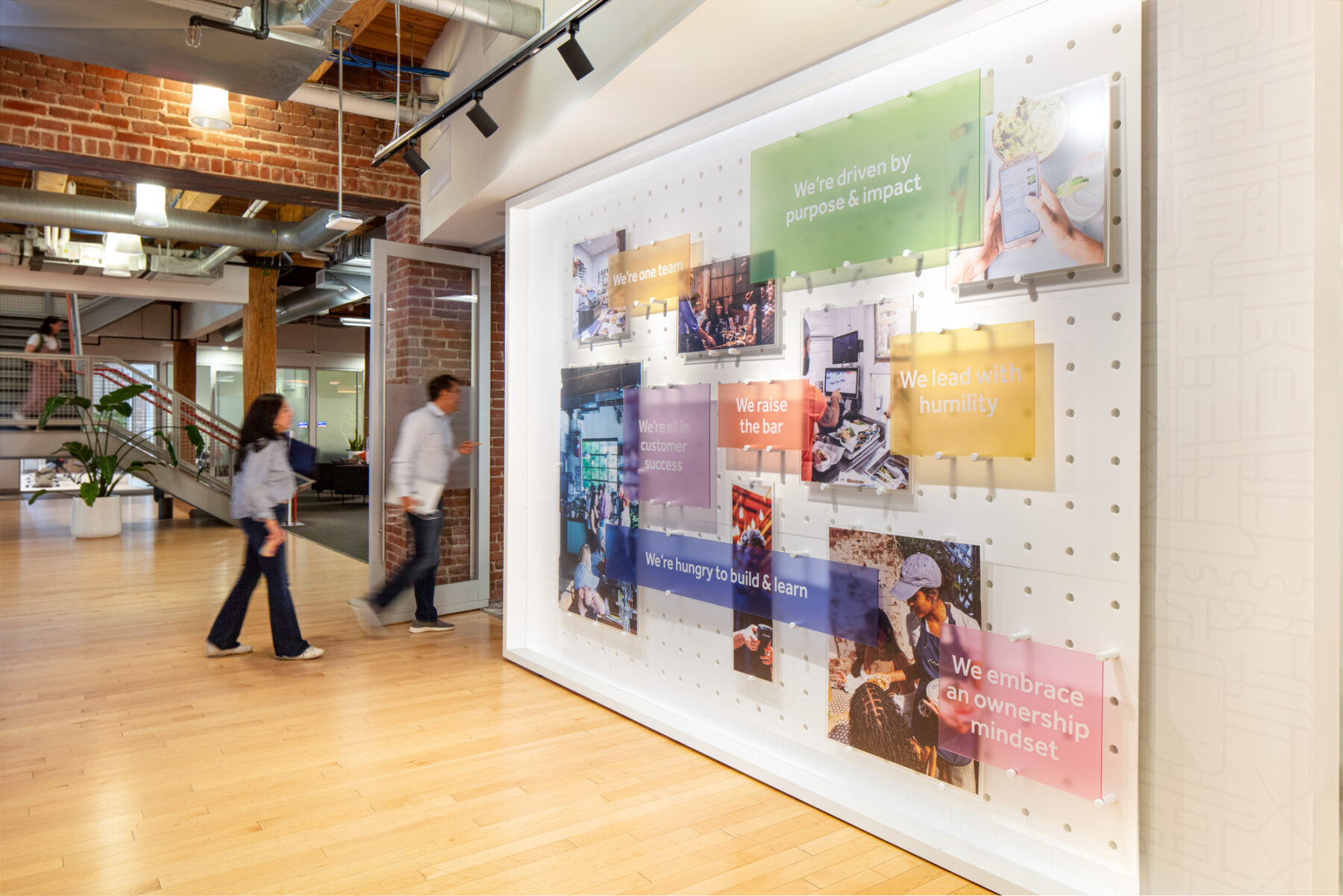 photograph of custom pegboard with custom fabrication panels and signage