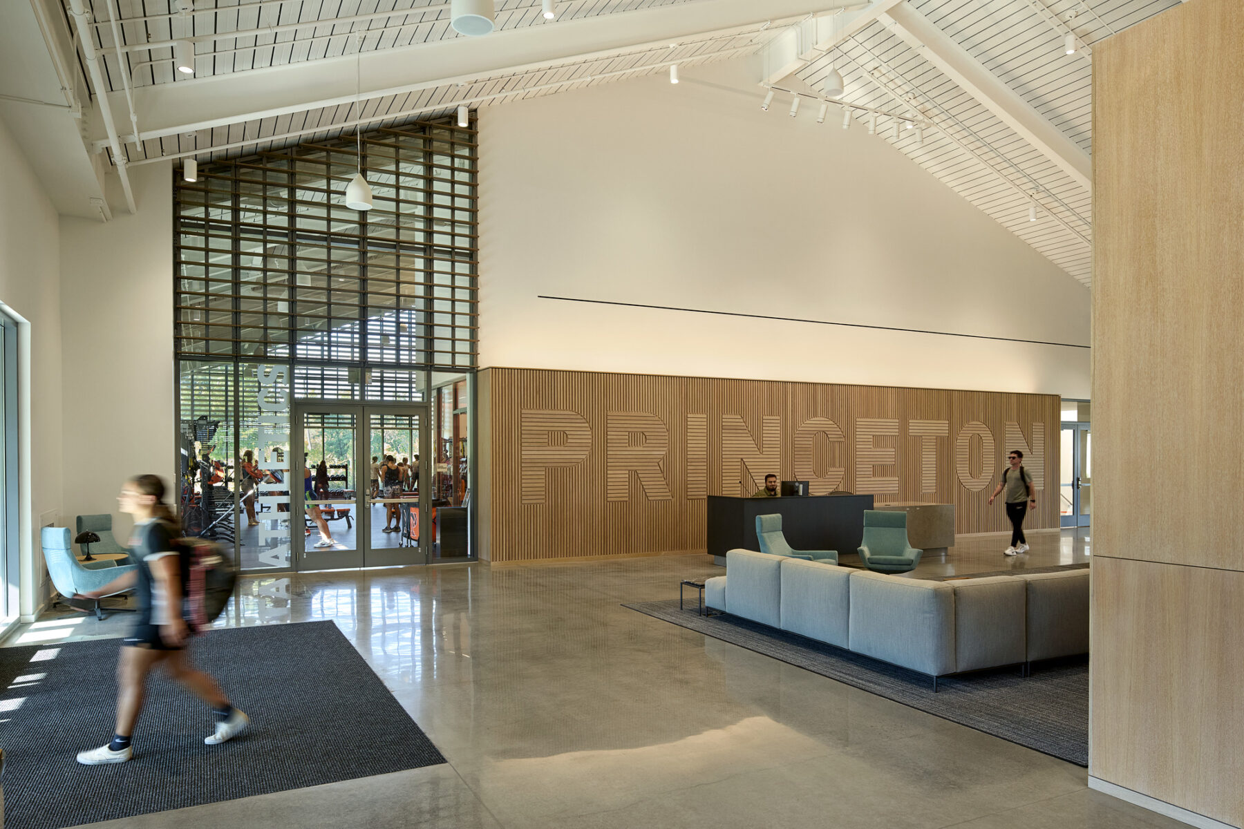 Photo of lobby and entry area with views into athletics dedicated fitness area