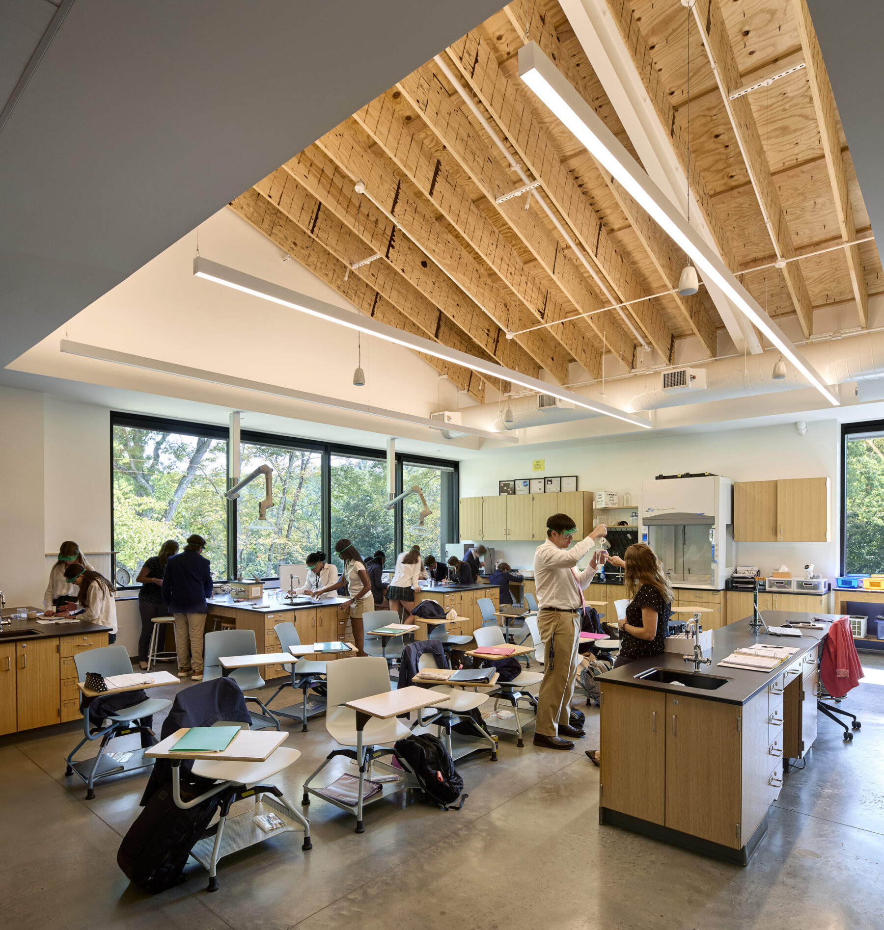 Interior photo of the Chemistry Lab at oblique angle featuring the vast angled wood ceiling
