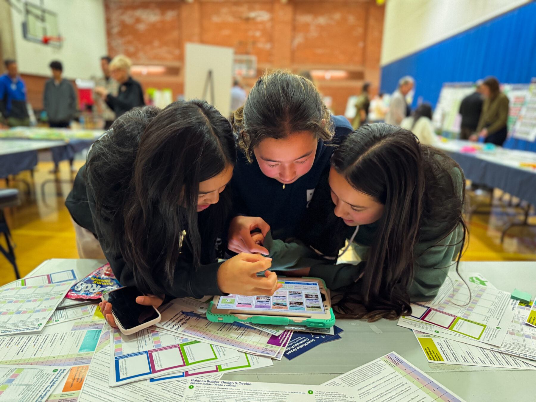 Young Santa Monicans play Balance Builder at a public engagement event in December.
