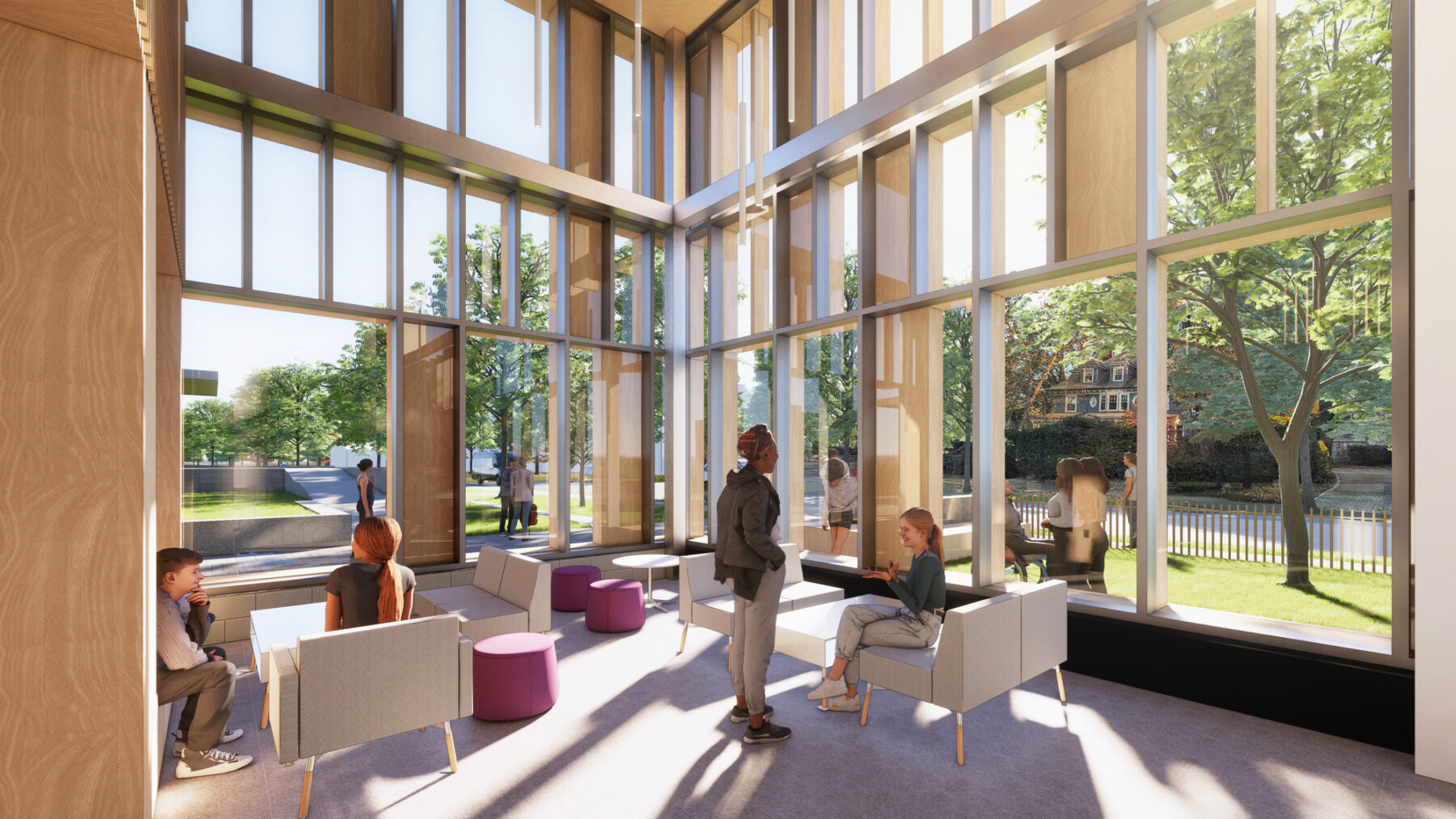 rendering of lobby space featuring tall windows with views out to campus landscape