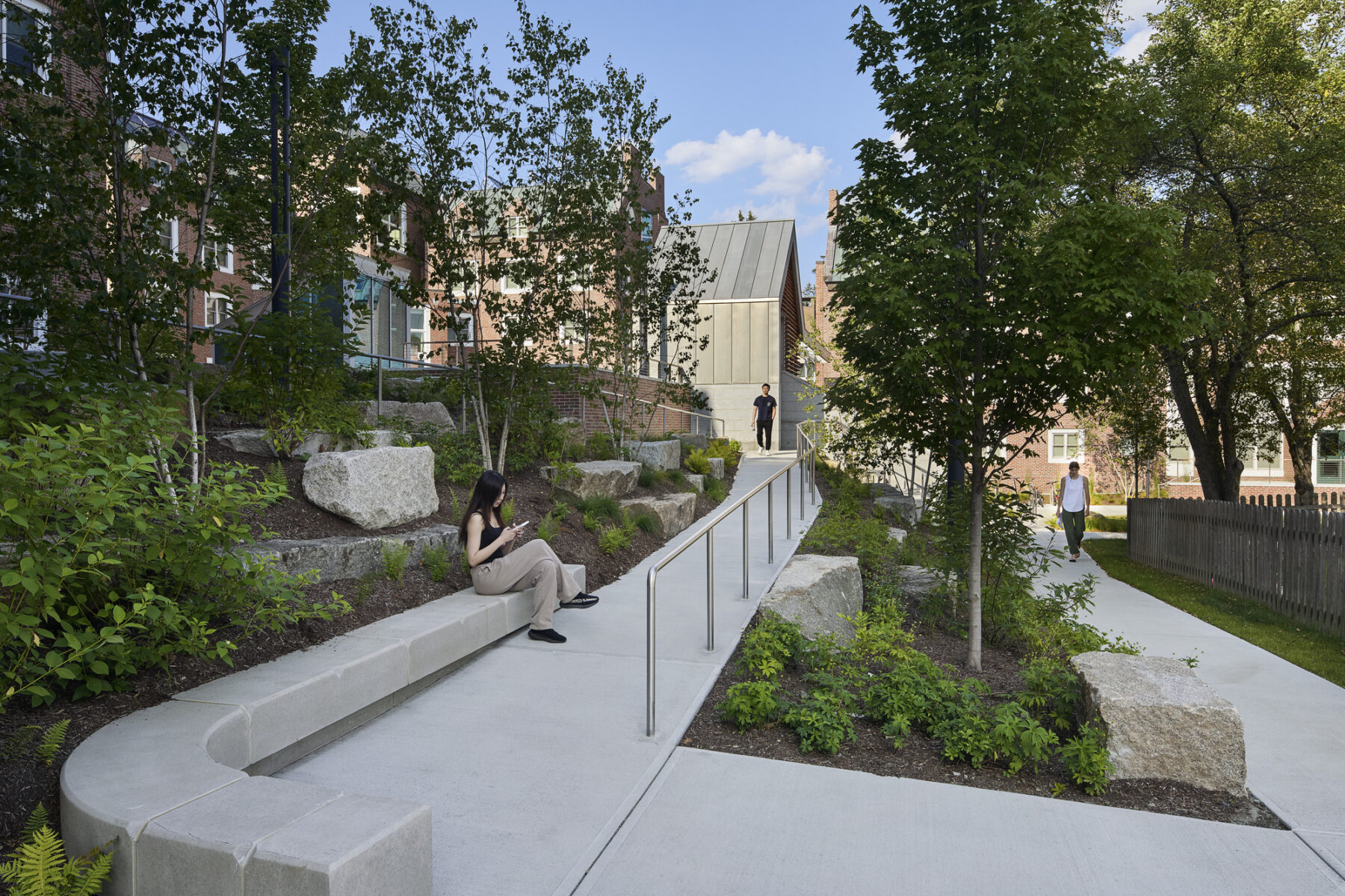 New accessible ramp to upper plaza with surrounding planting areas