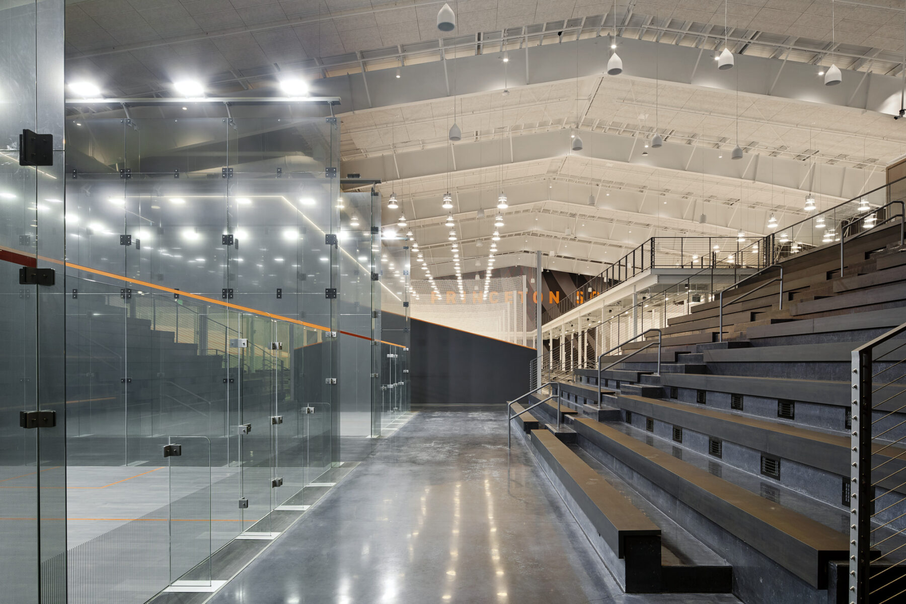 photograph of squash courts and bleacher seating