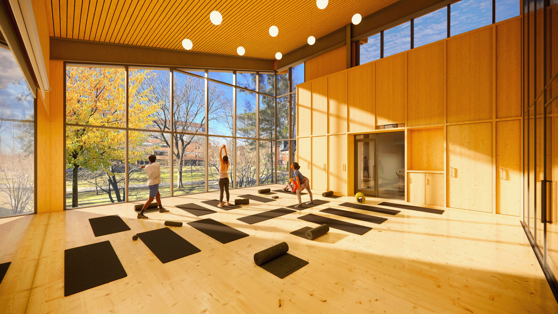 Rendering of fitness studio with yoga mats and fully transparent wall overlooking the quad with natural light streaming in