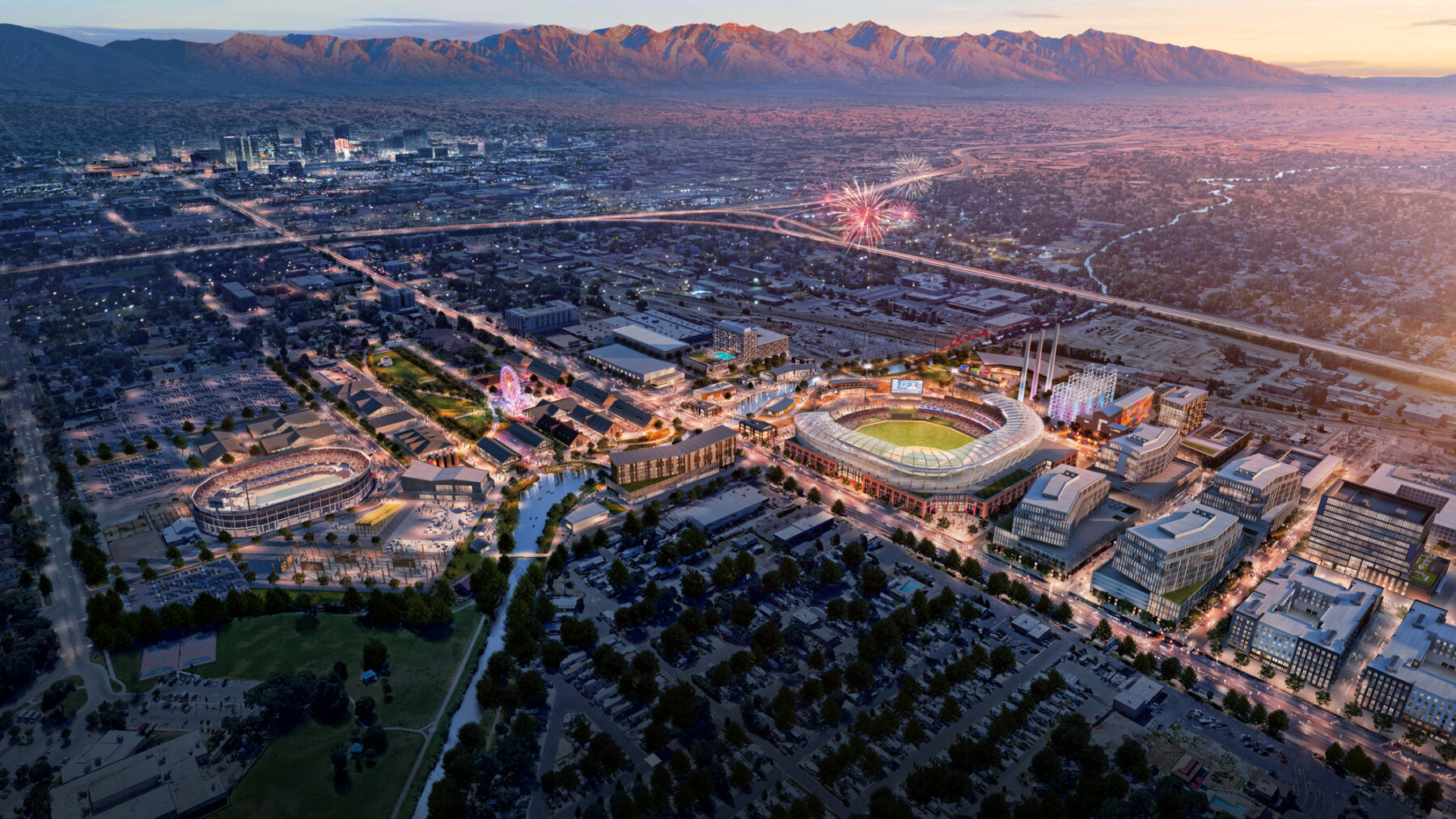 master plan aerial rendering of urban district including a stadium, a river, and mixed-use buildings