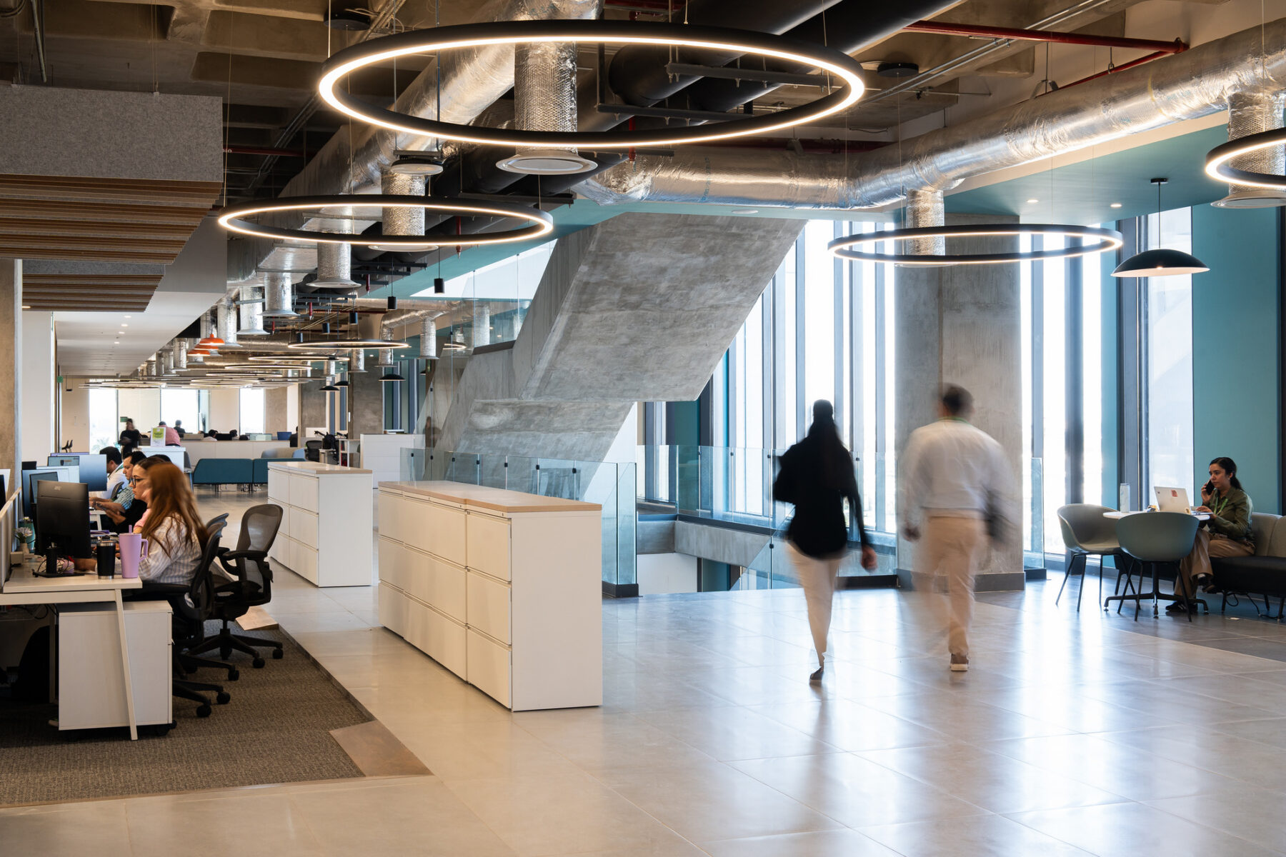 Interior photo of collaborative space and hallway showing