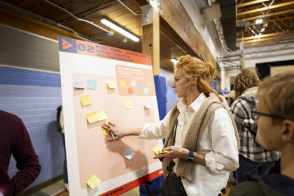 A community member during a community information meeting to inform and request input from the community on Thursday, February 12, 2026 at La Alma Recreation Center in Denver, Colorado. Photo by Gabriel Christus / Denver Broncos
