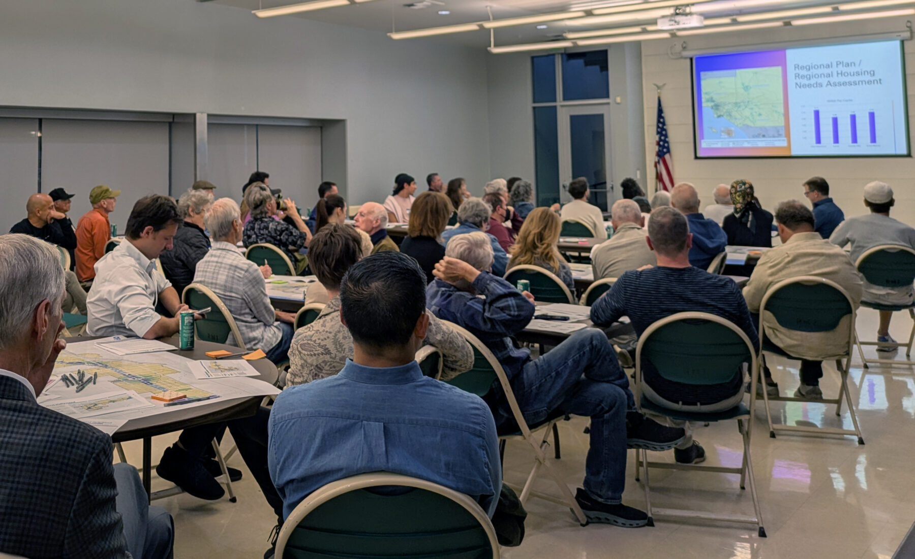 Community workshop in West Hollywood with on-screen presentation